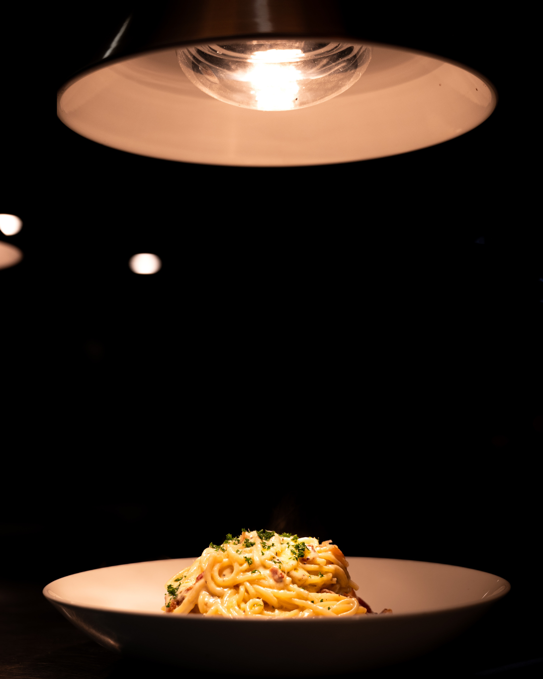 Spaghettoni alla Carbonara with guanciale and pecorino at Fellini Italian Restaurant Hobart