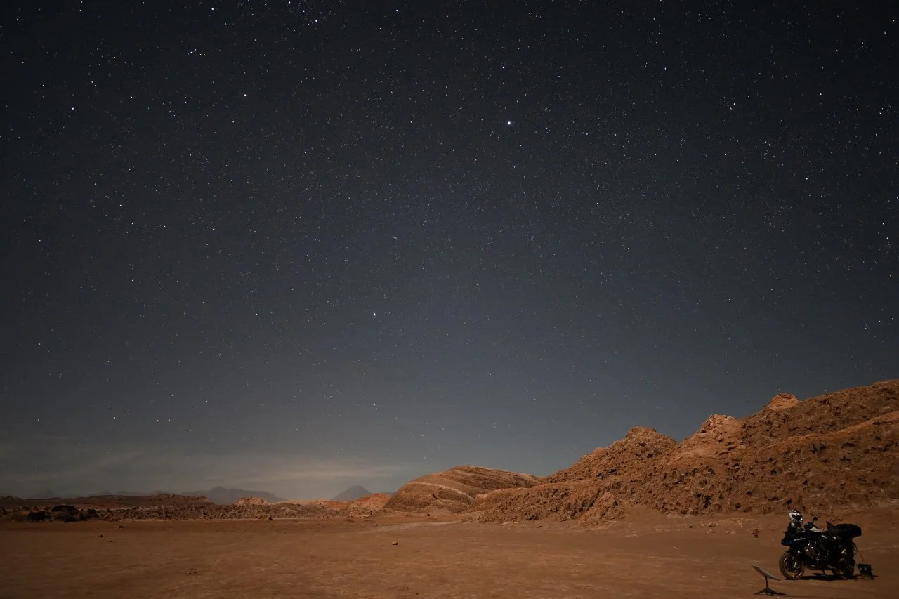  the campsite lit up only by the stars
