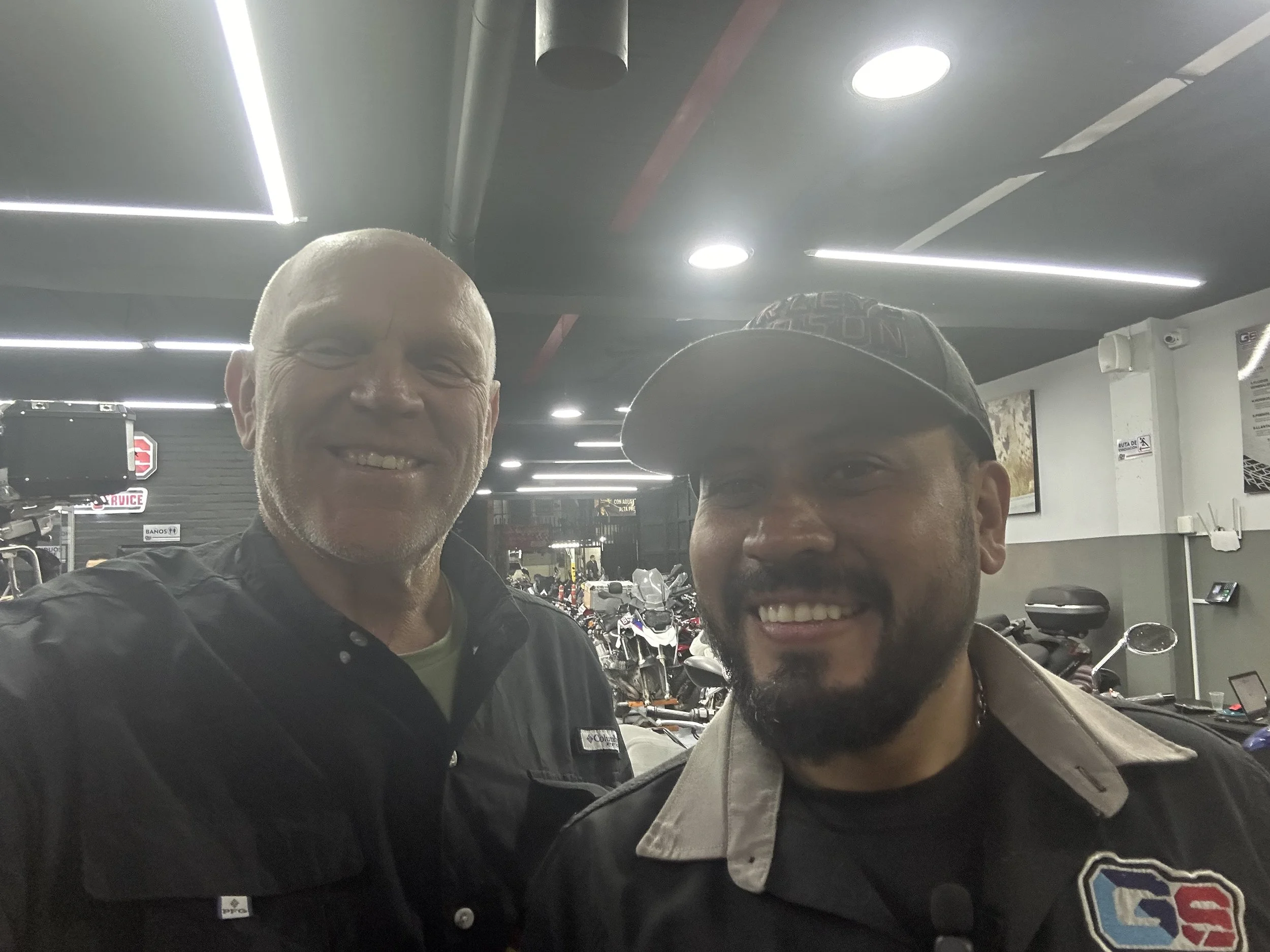 Edward, the shop's owner and me