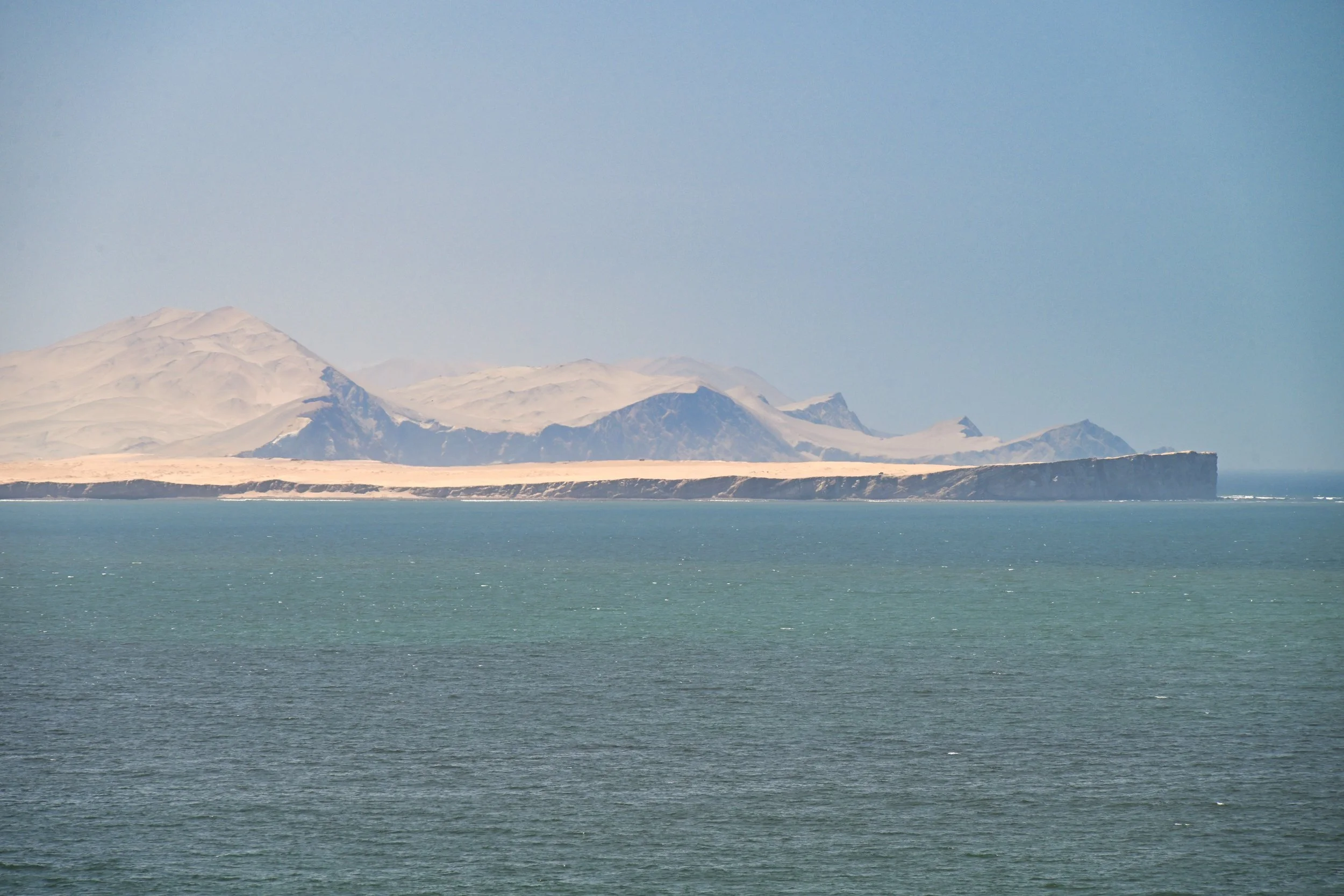 on the other side of the bay