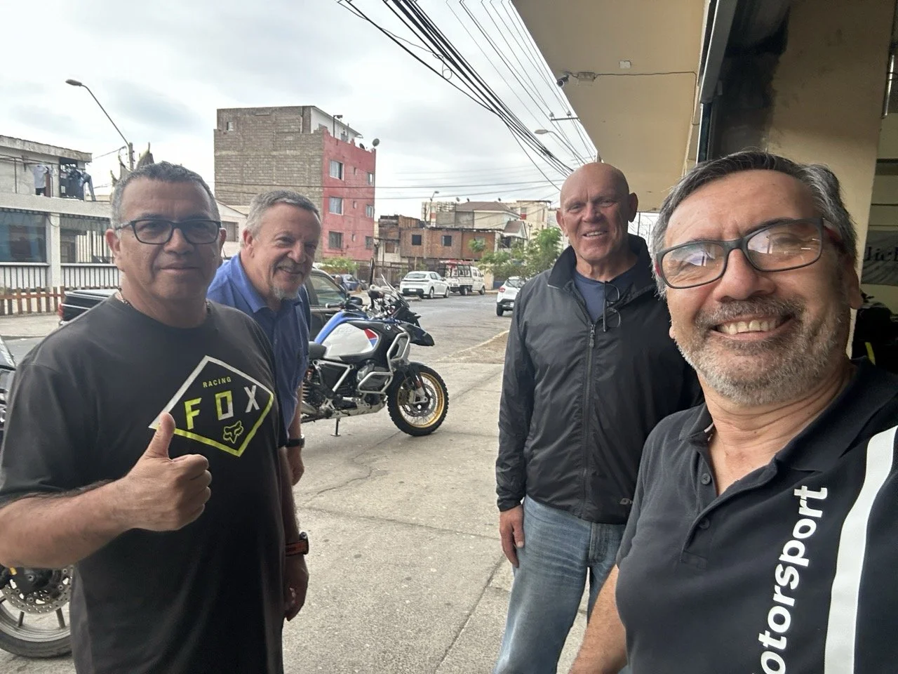 the entire crew who was helping with my bike today. German, the puma guy (he hit 200 lbs puma at 120 km/h on his BMW R1200GS. The puma was dead and he got away with broken wrist.) Then me and Luis on the right