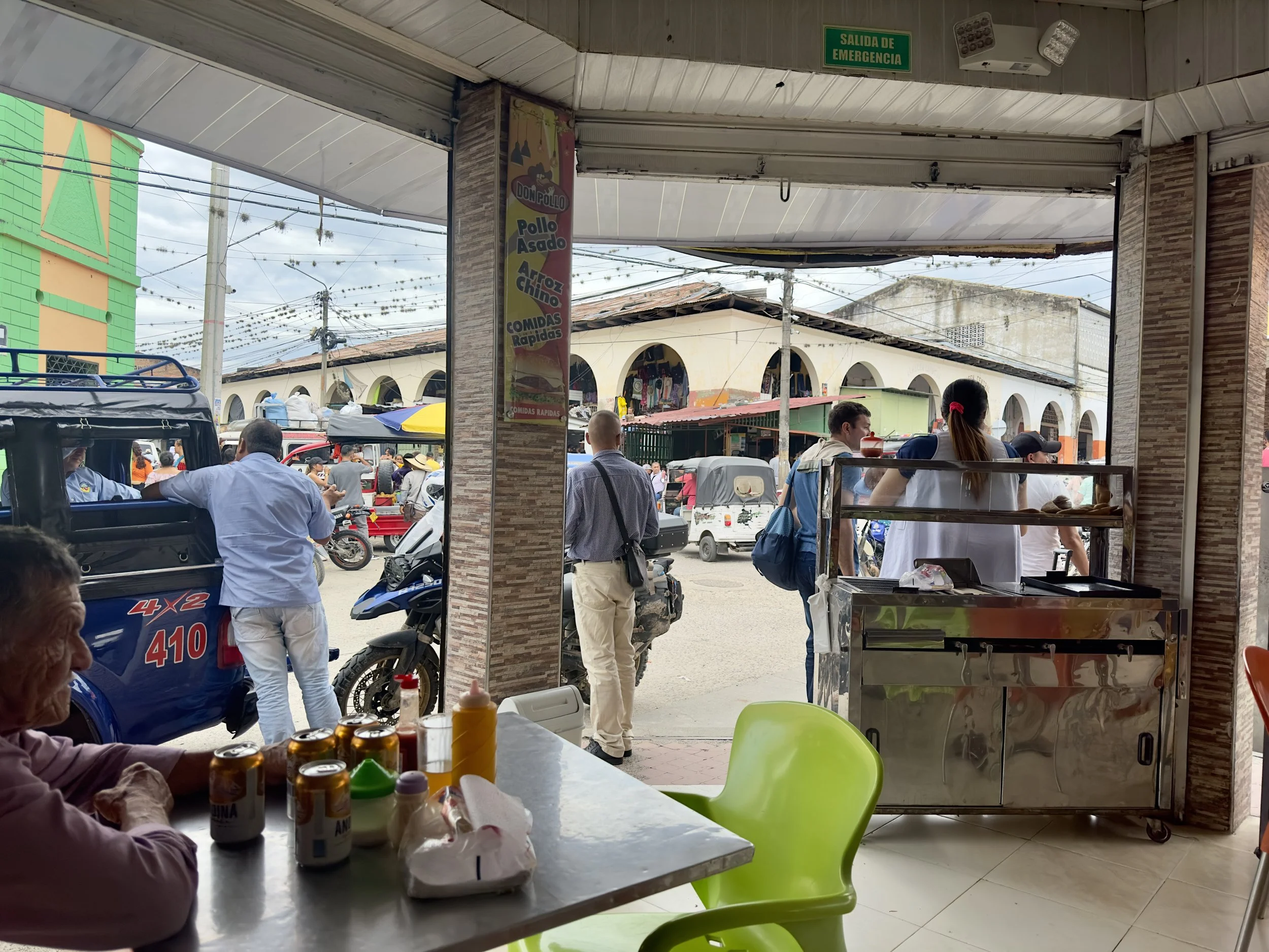 having lunch in the middle of the town. The road is close for the bike race