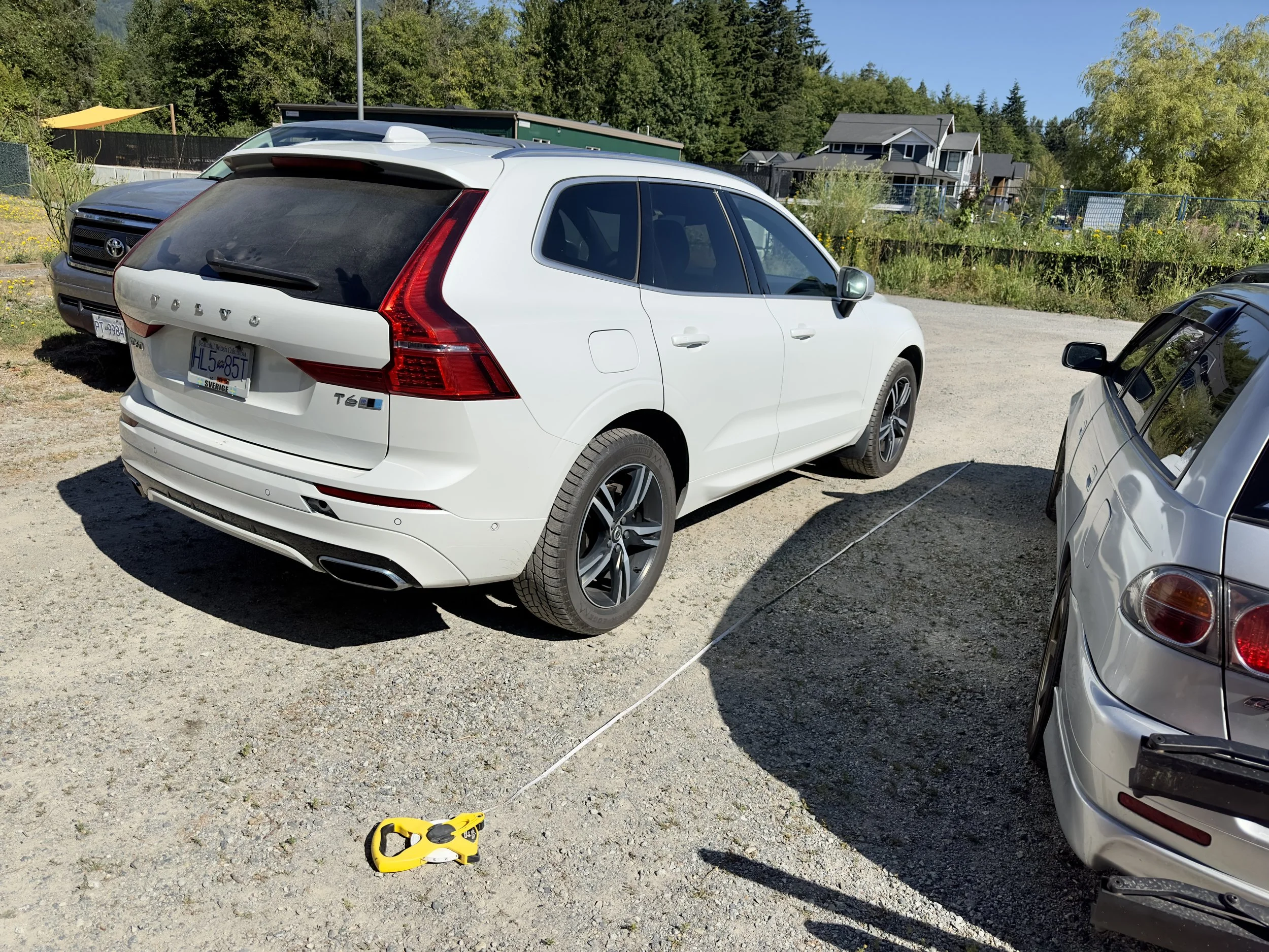using the latest measuring techniques to figure out if the car fits in ...