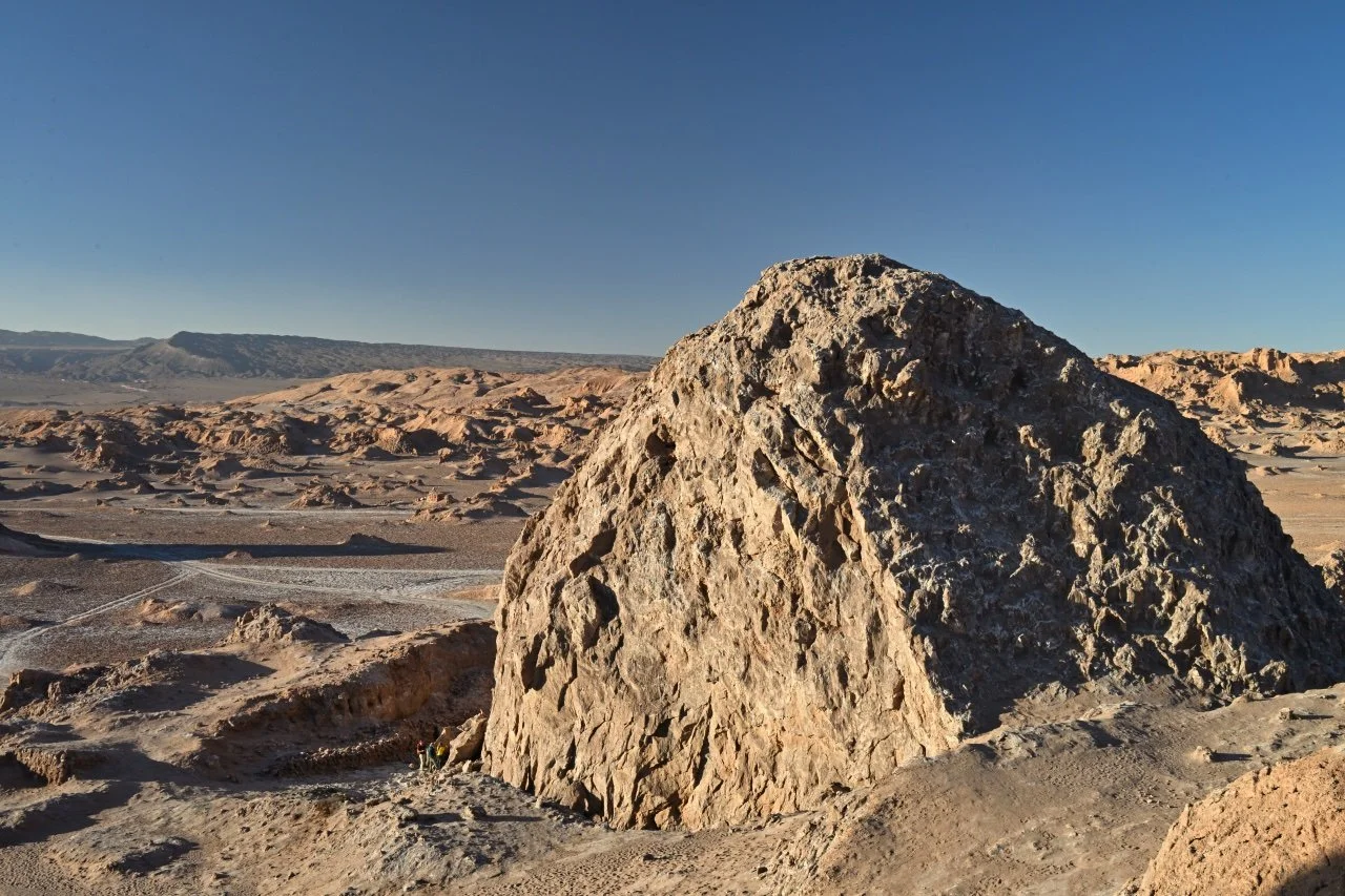 The salt mountain. Can you see the people in the picture?
