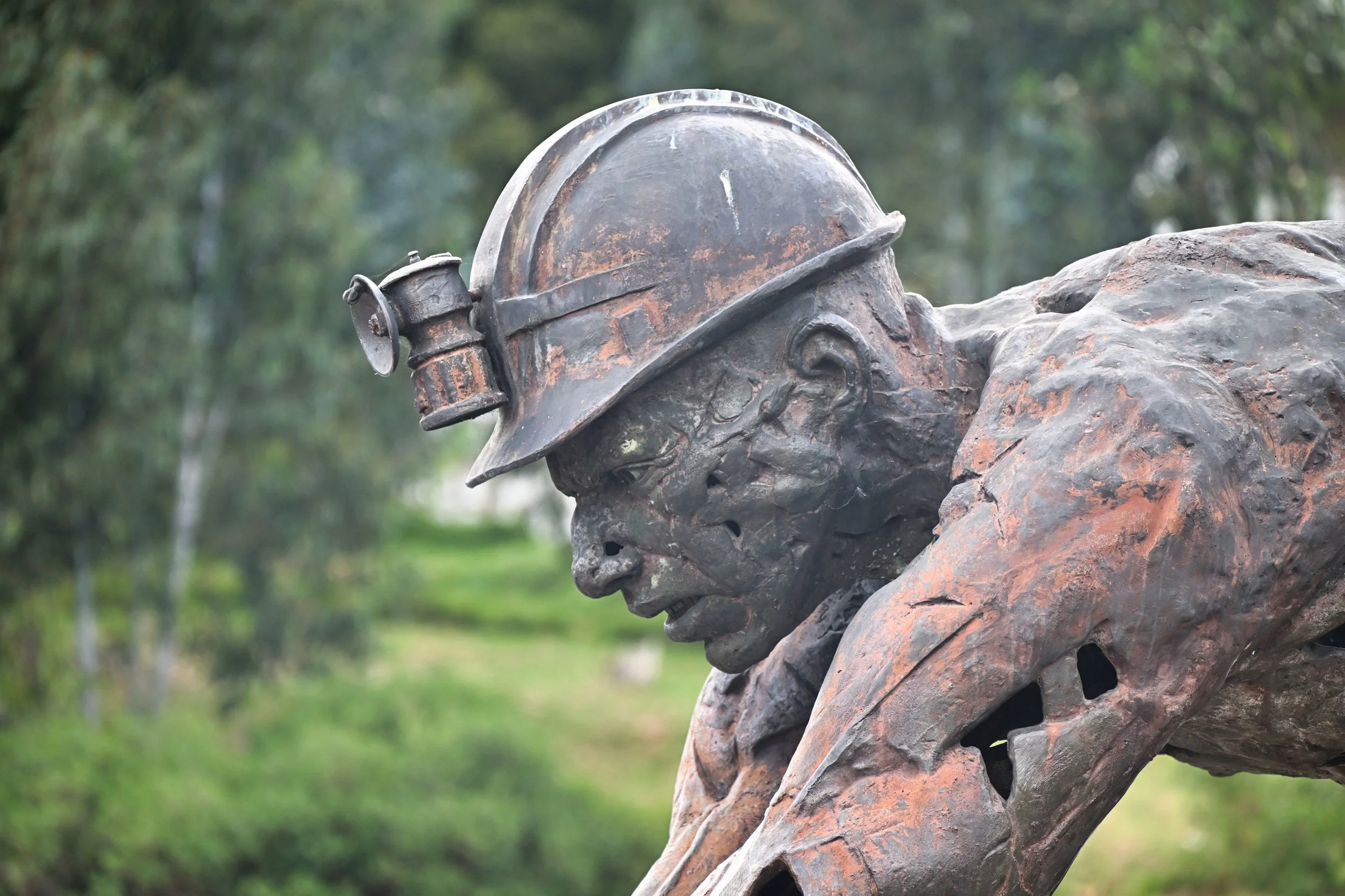 a miner's statue
