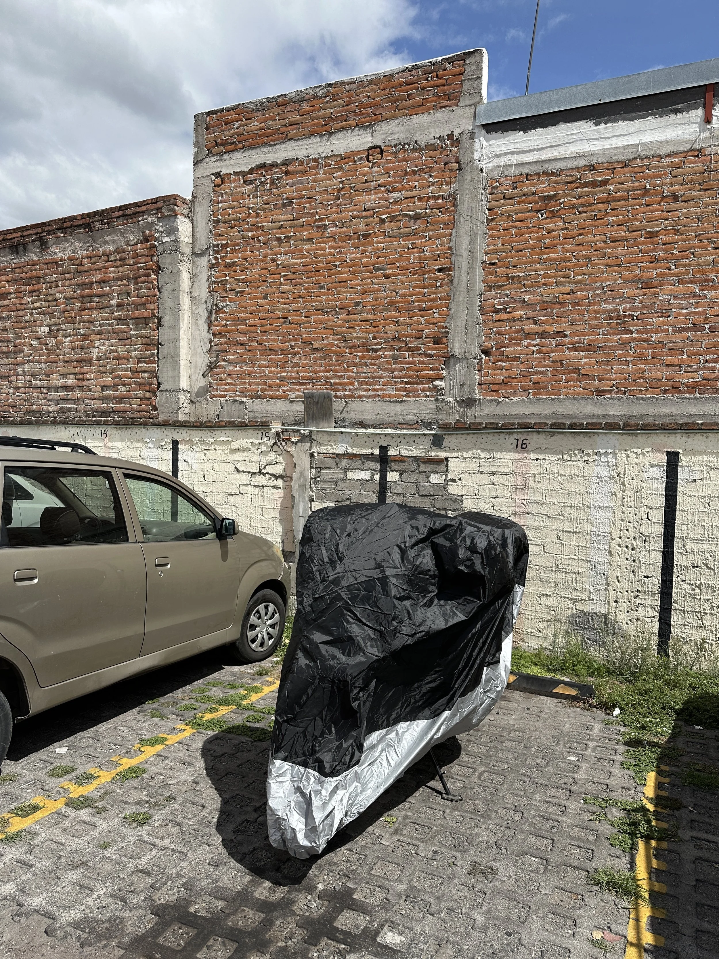 nobody can see that expensive  BMW underneath