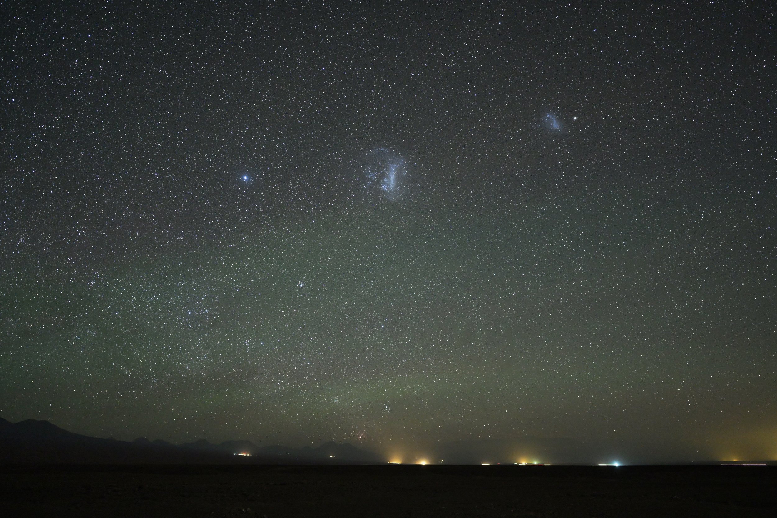 two white spot among the stars are actually 2 galaxies out of our solar system, approx 200,000 light years away