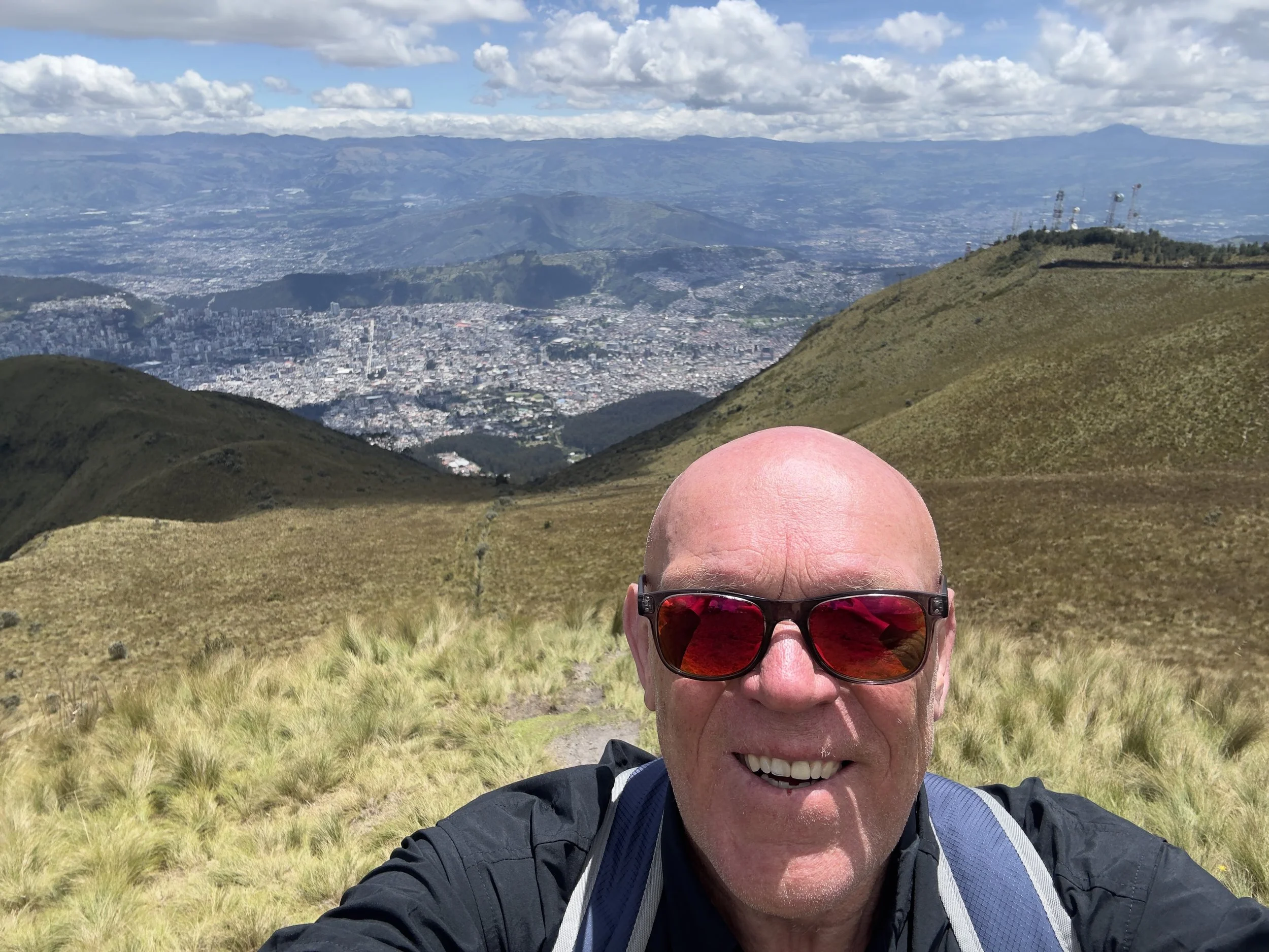 smiling but it is a HARD walk above 4,000m