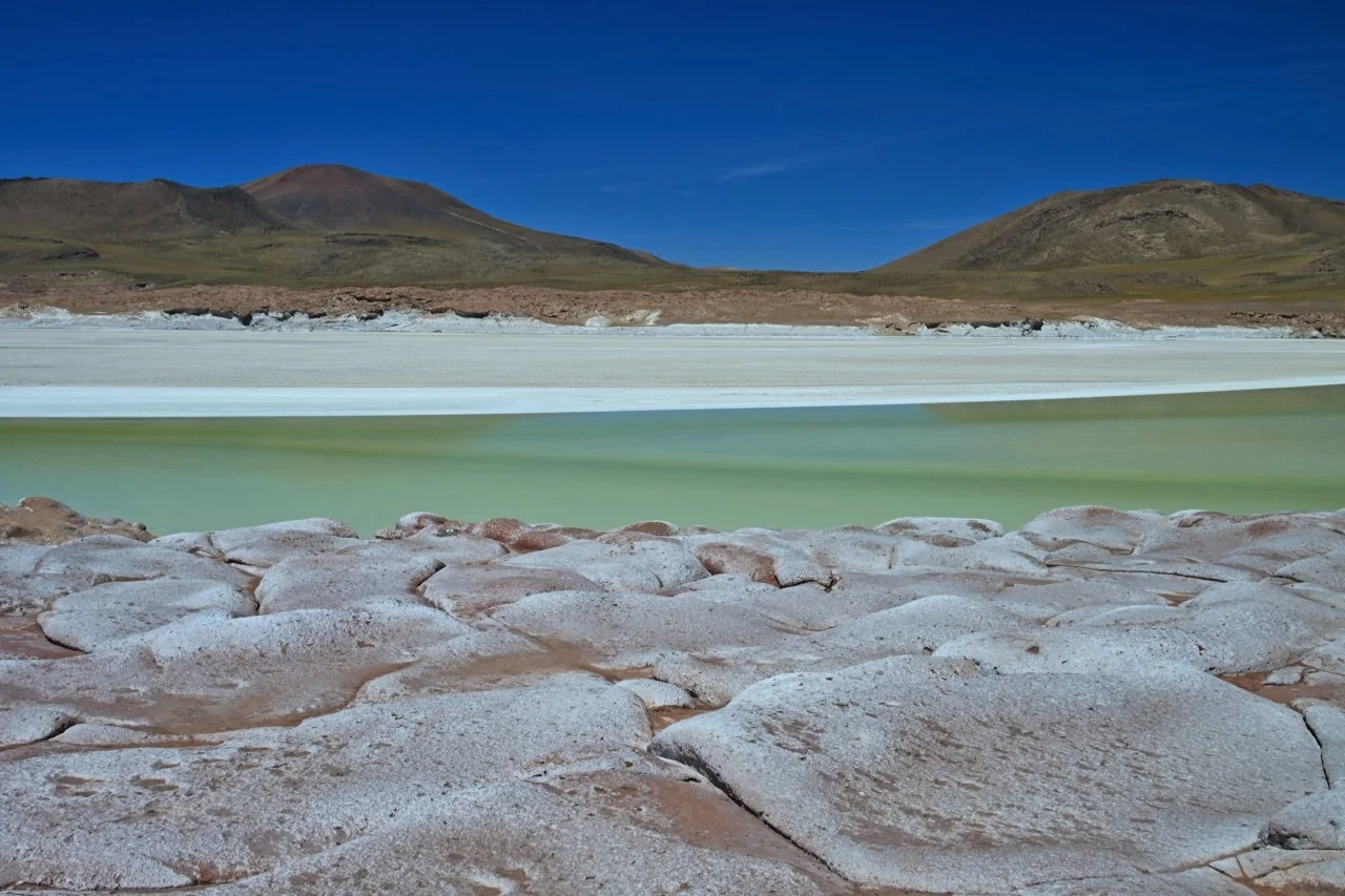  amazing rock formation with contrasting water colours and the sky