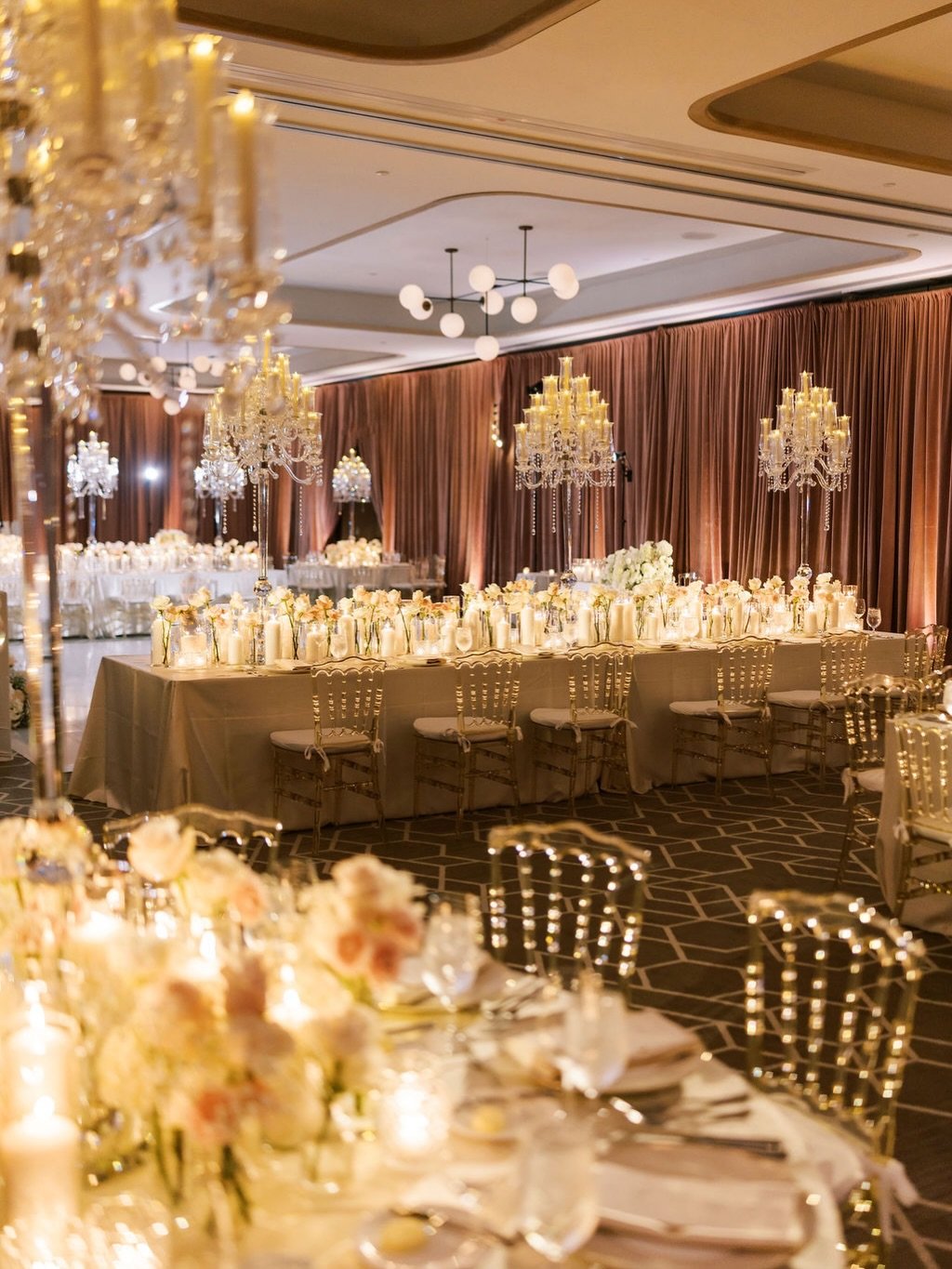 Designing moments that feel as beautiful as they look.

A timeless tablescape where every detail and every angle was thoughtfully curated to evoke effortless elegance. Layers of soft mauve, blush florals, glowing candlelight, and sculptural glass can