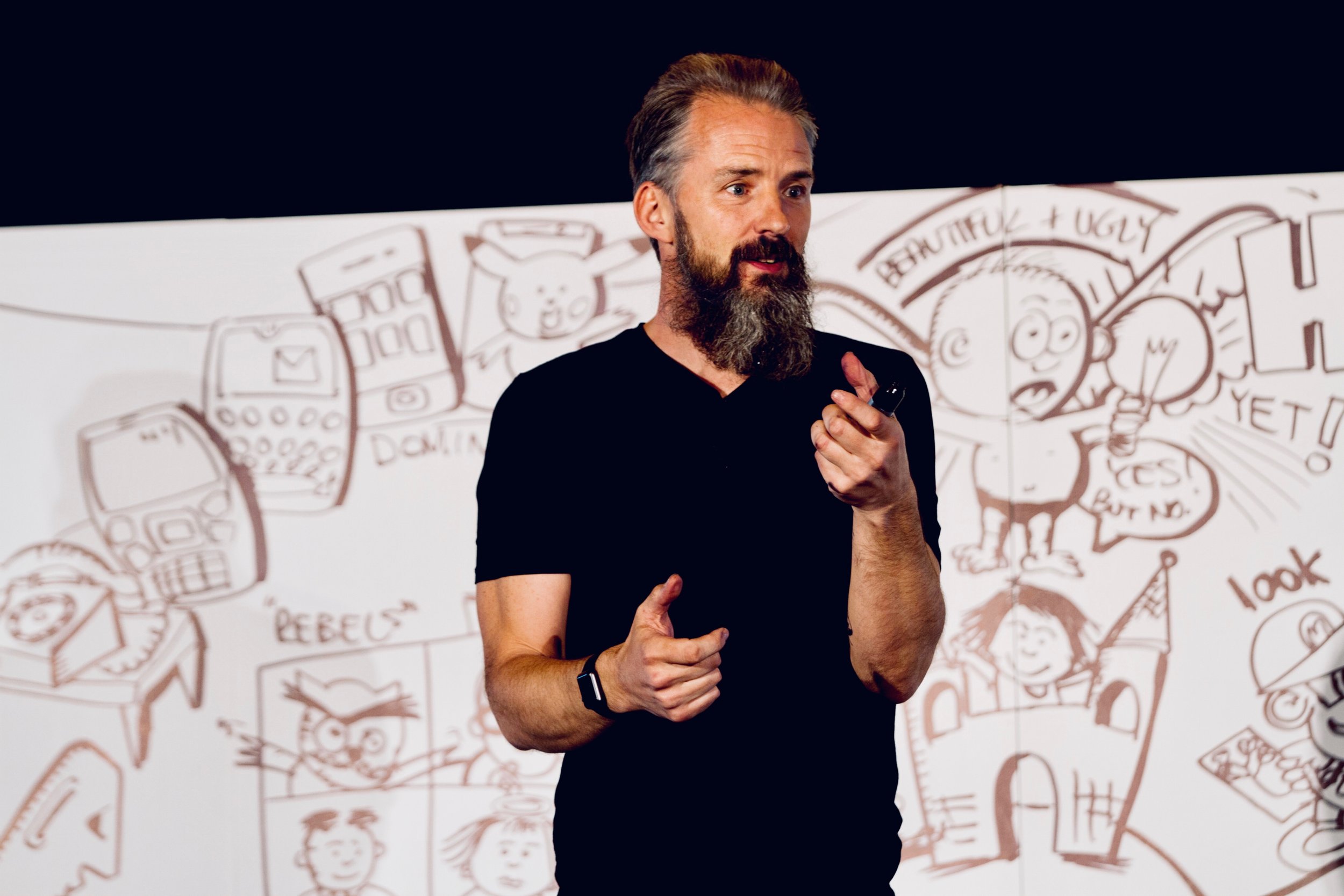 Max Mckeown in front of artwork.JPG