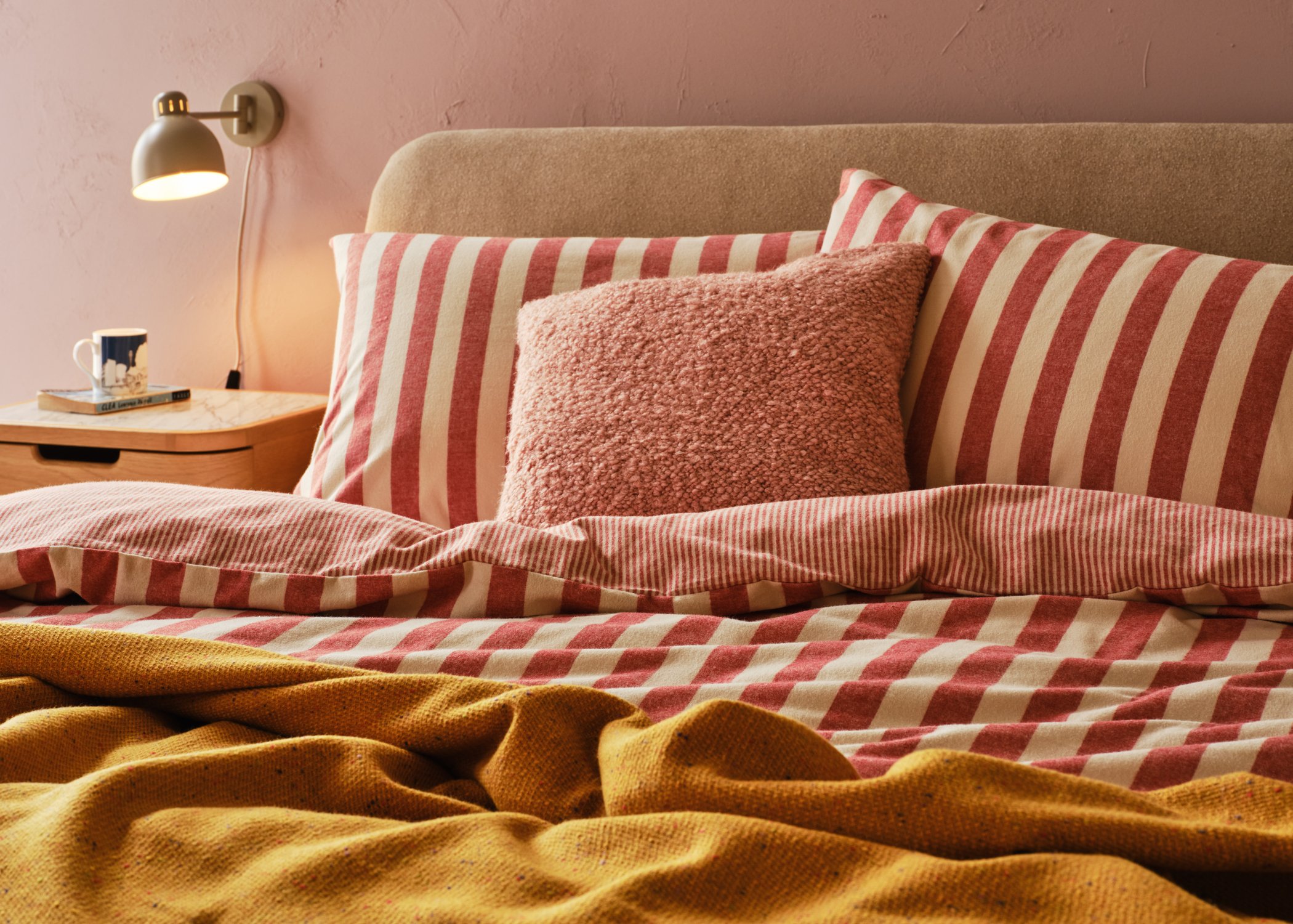 Lifestyle image of striped bedding
