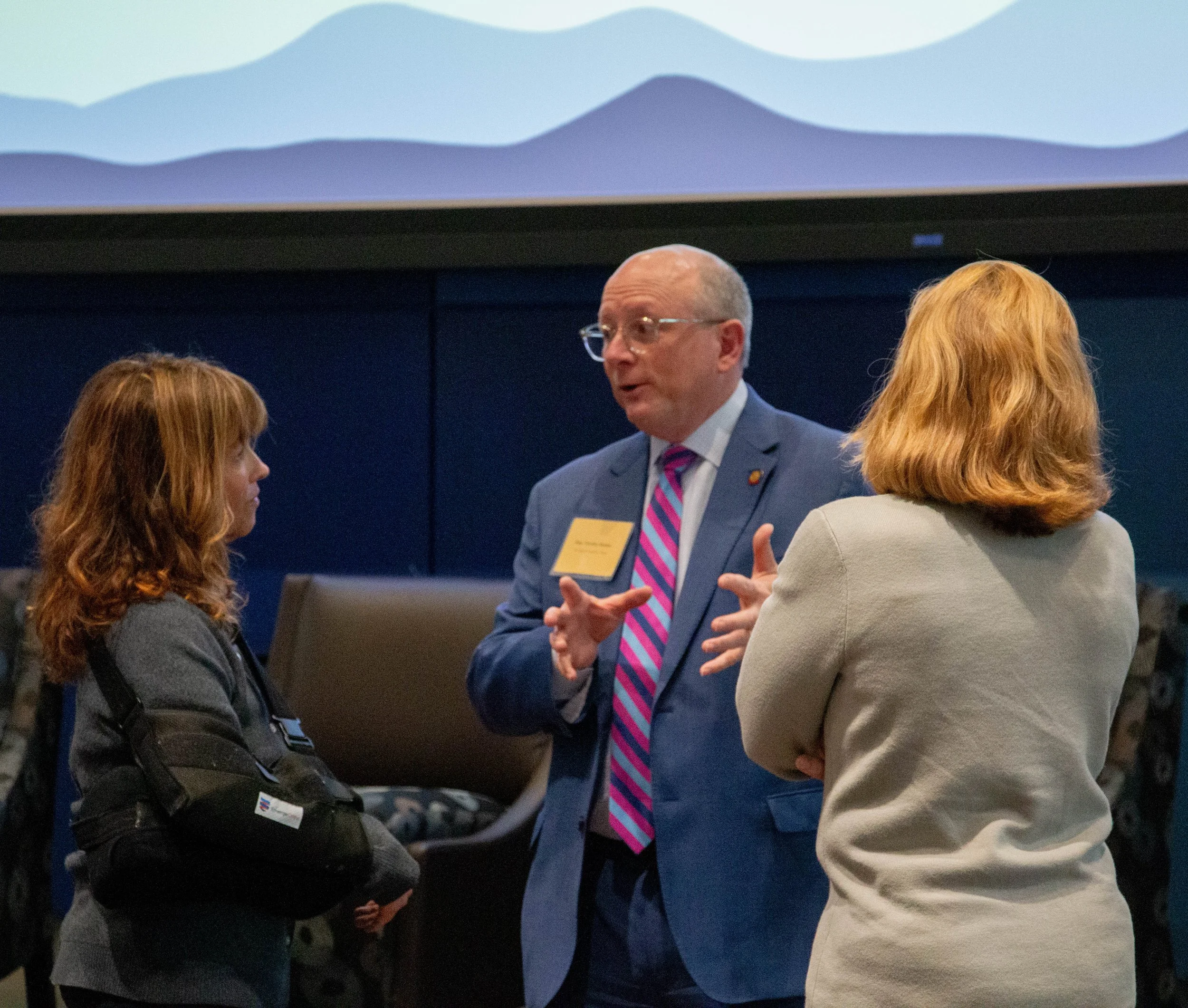 Rep. Tim Reeder speaks with attendees. Photo credit: Michaela Lumpert, Impact Health