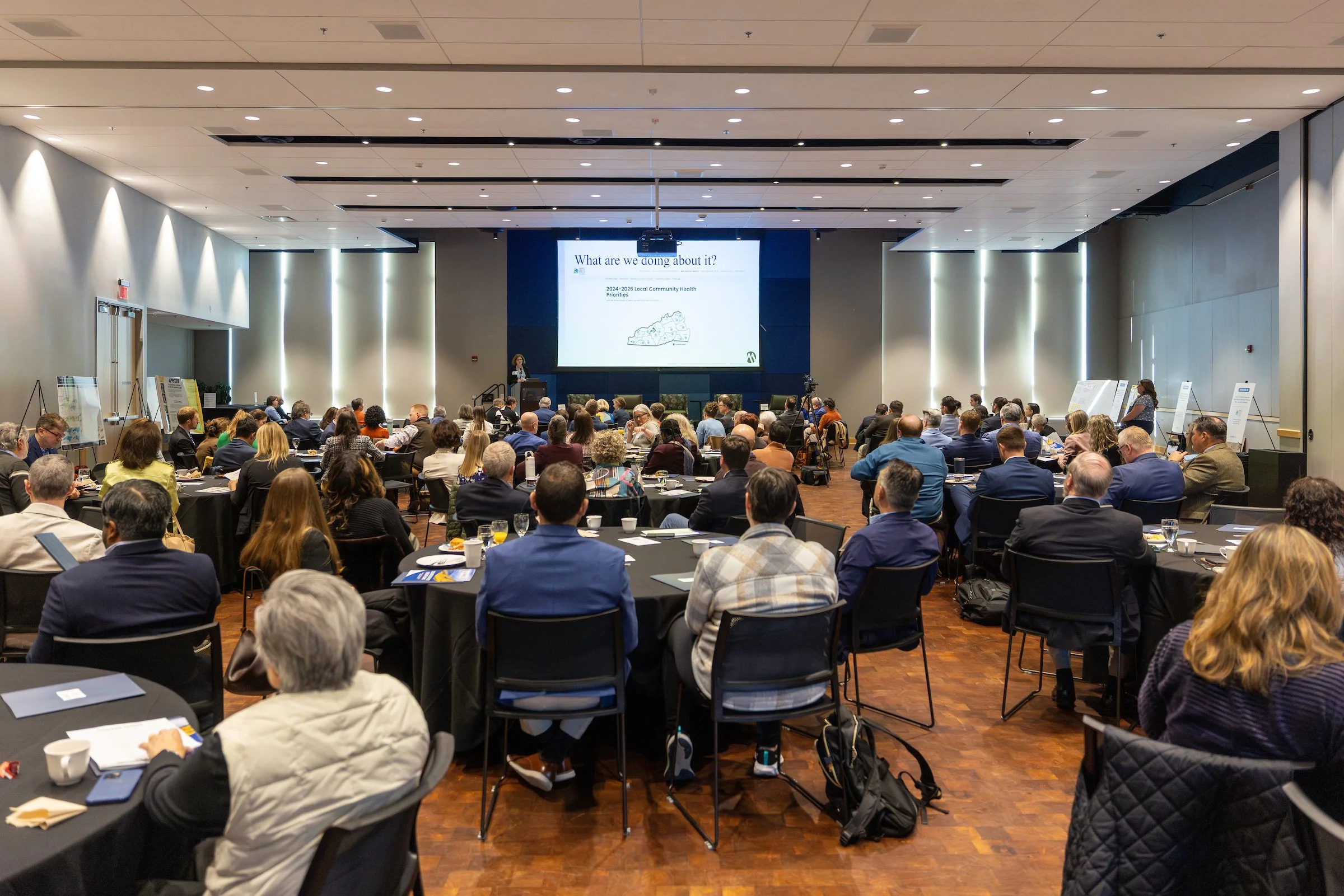 Laurie Stradley (CEO, Impact Health) delivers keynote address “Transforming for Resilience: How Western North Carolina is Reimagining Rural Health.” Wide shot. Photo credit: Emmanuel Figaro, UNCA