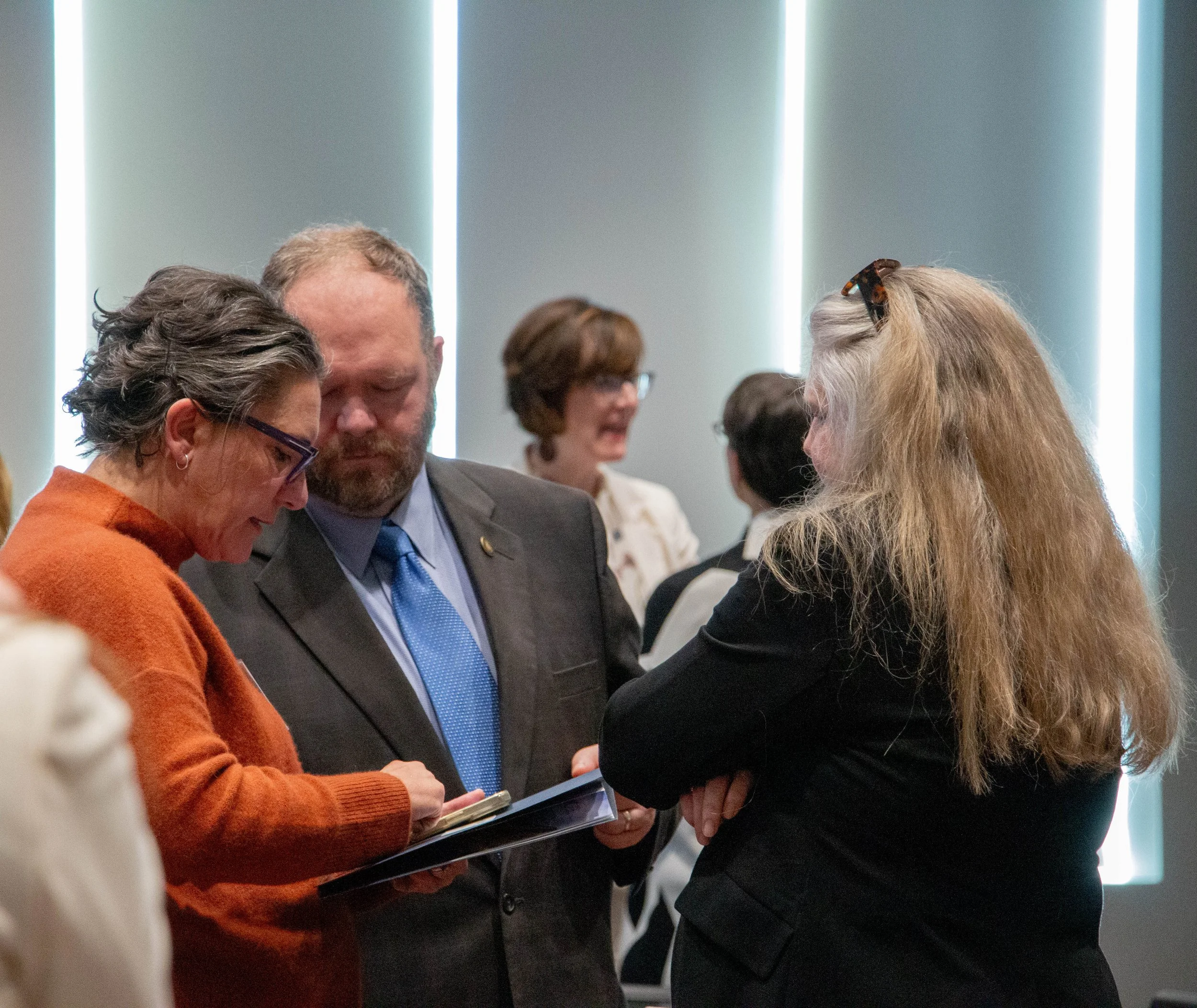 Sen. Hise and Melanie Bush speak with attendee. Photo credit: Michaela Lumpert, Impact Health