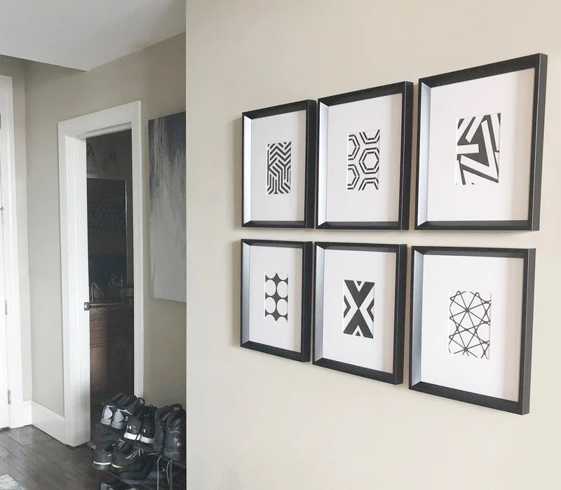 Gallery wall of framed art
