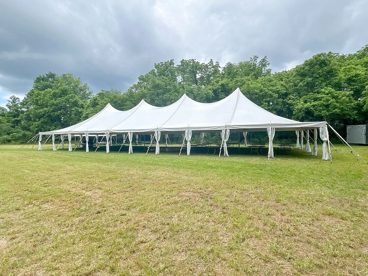This weekends wedding install featuring our 40x100 tent, lighting, pole drapes, dance floor, fruitwood chairs &amp; tables! 
&bull;
&bull;
#nashvillewedding #nashvilleevents #nashvilleparty #middletn #eventrentals #tent #wedding #weddingdecor #nashvi