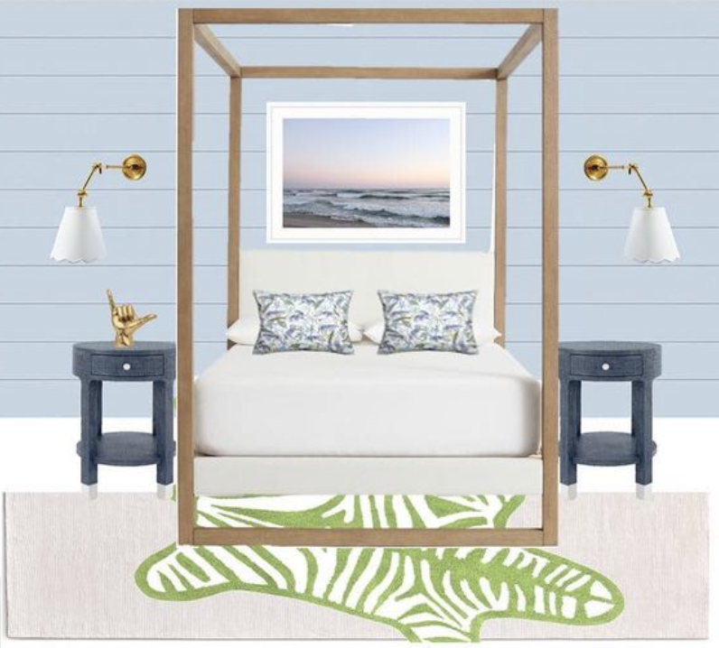 A bedroom with a four-poster bed, nightstands, and wall-mounted lamps, featuring a coastal painting and a green striped rug.