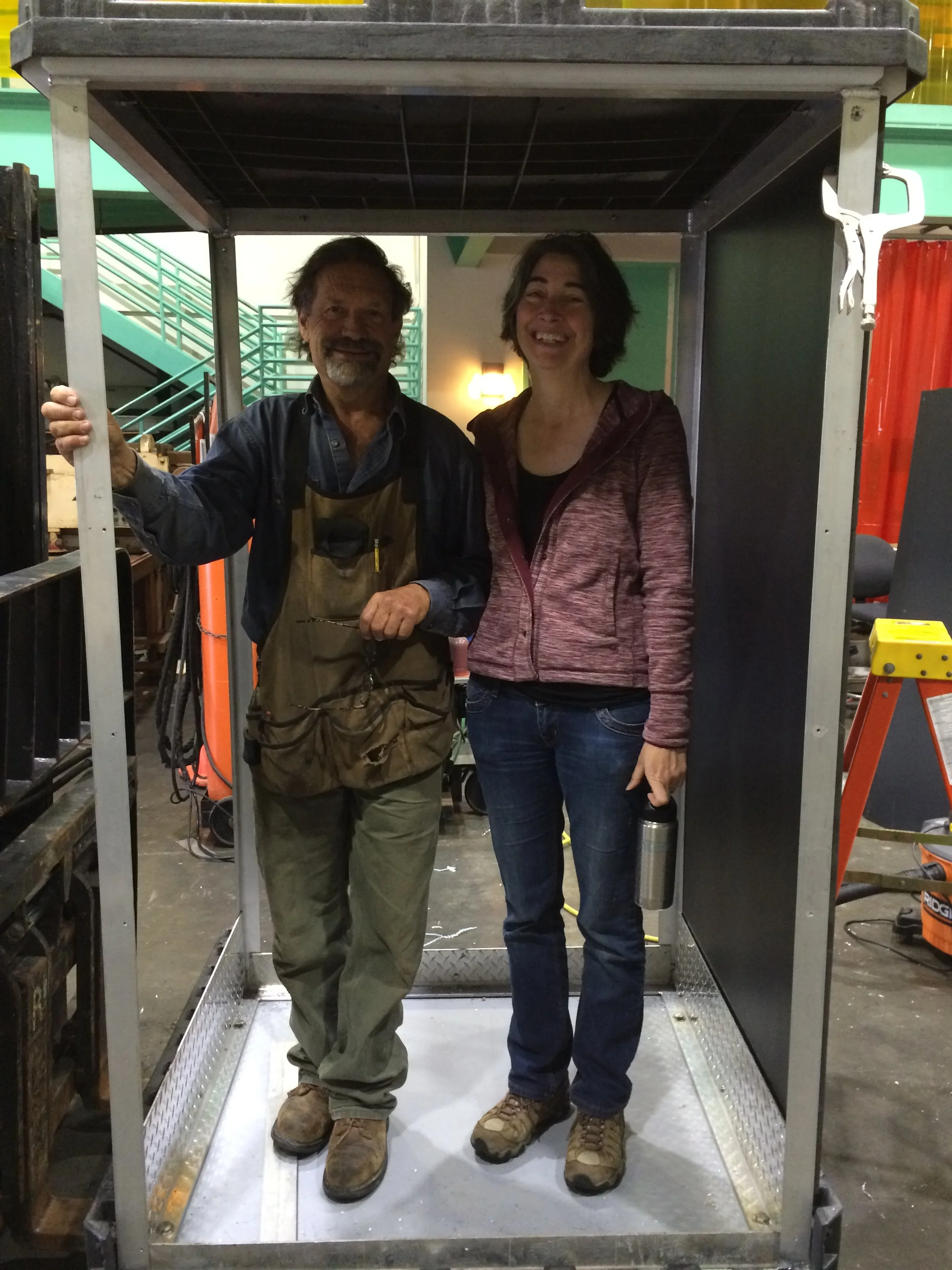 Alex and Larry Bird constructing a flying crate for the InFlux