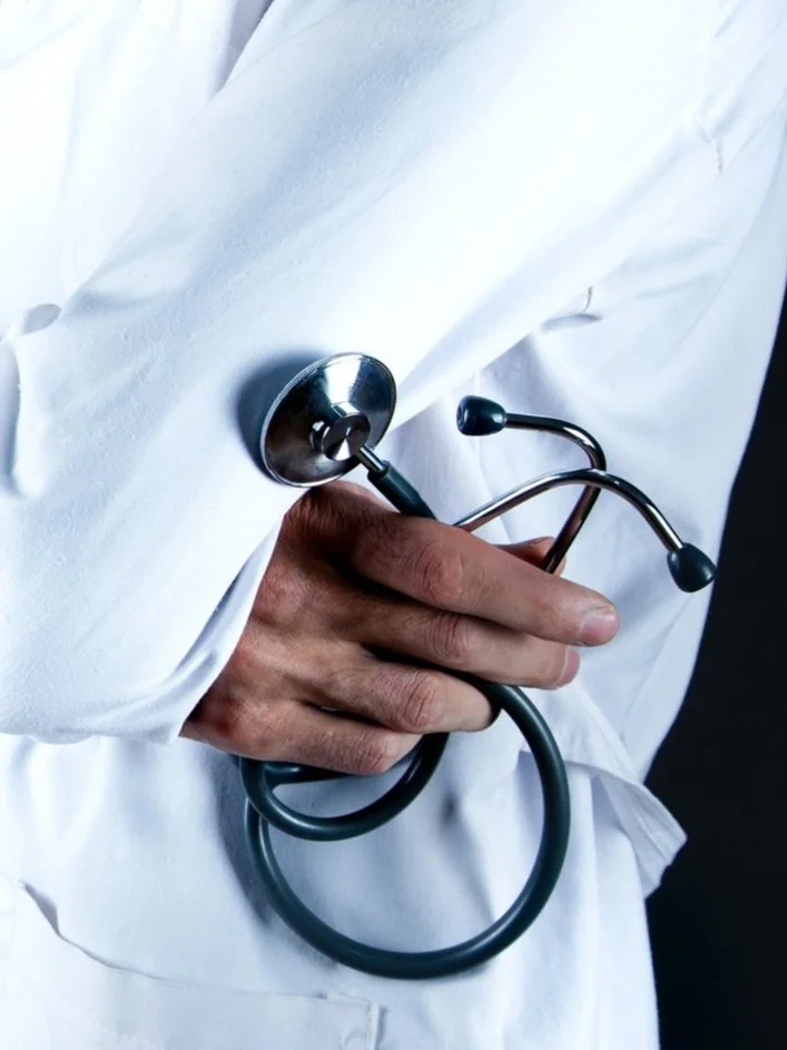 Doctor holding stethoscope