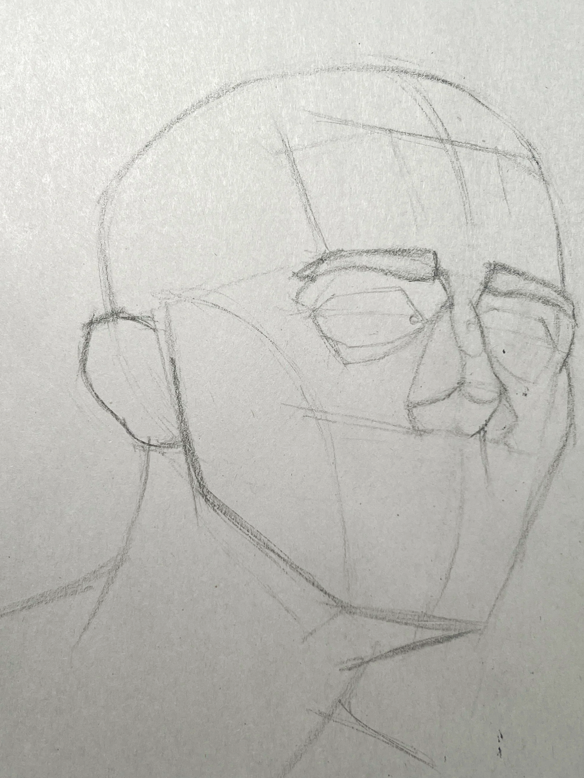 Sketch of a person's face, showing the outline of the head and facial features.