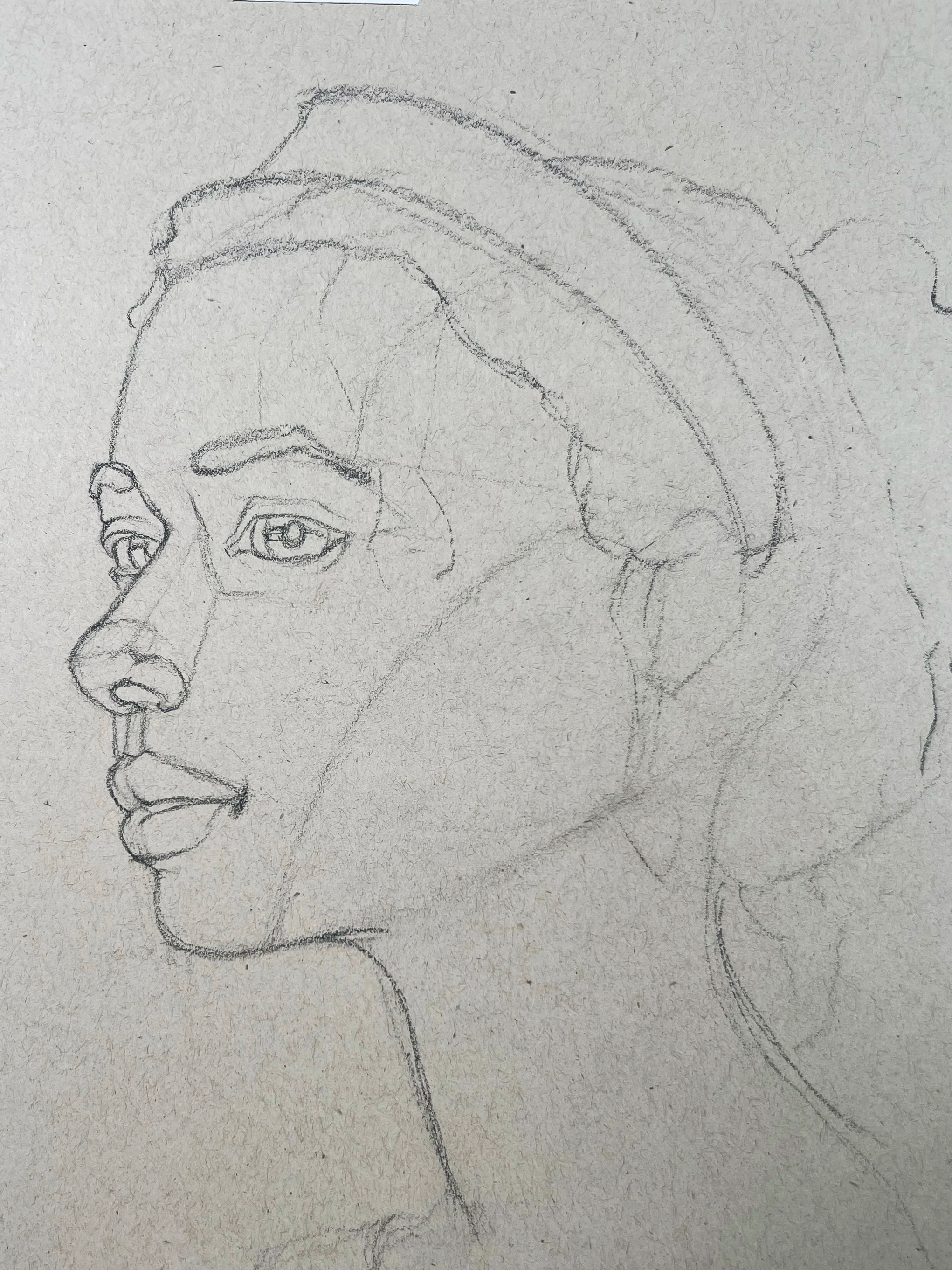 Pencil sketch of a woman's side profile, showing her facial features and hair.