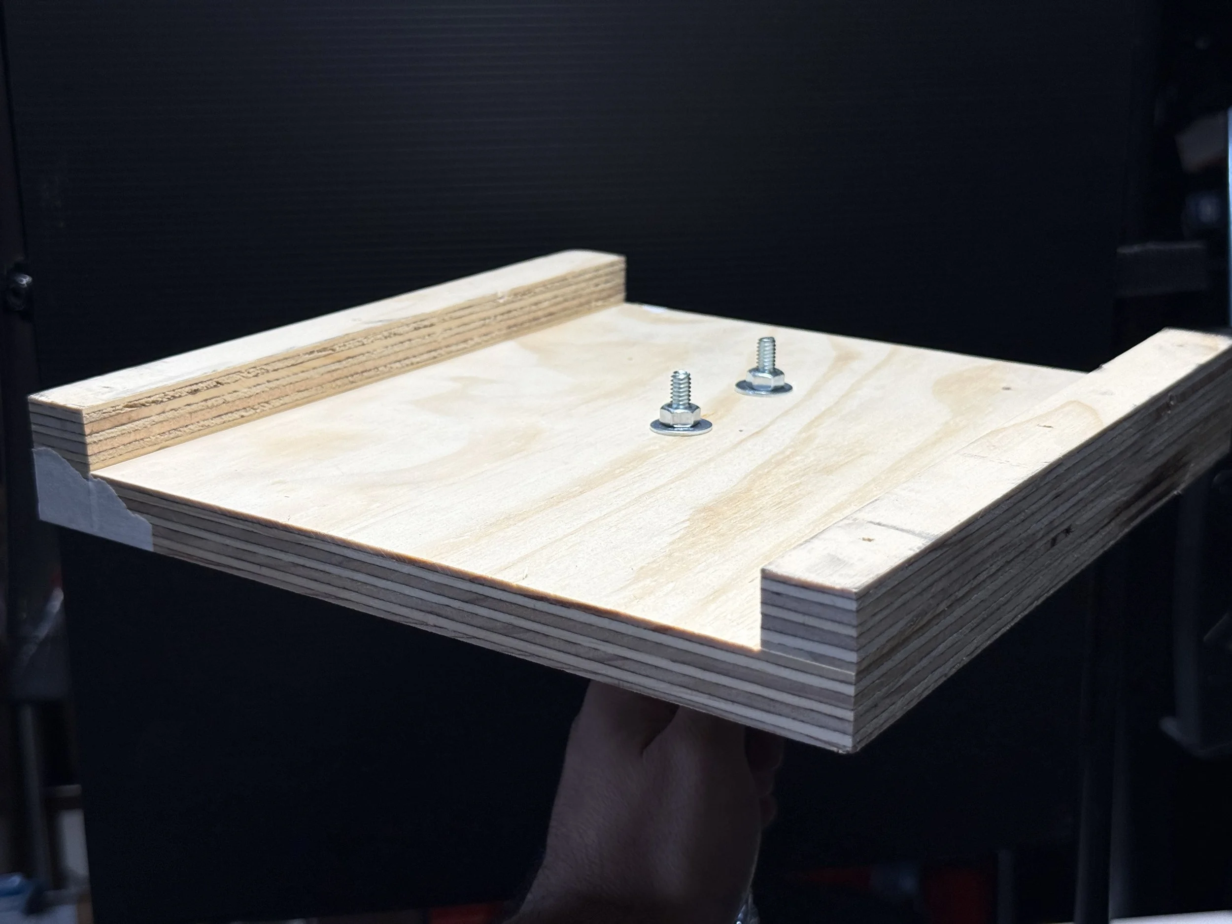 The bottom of the base. Two bolts are used to mount the floor flange.