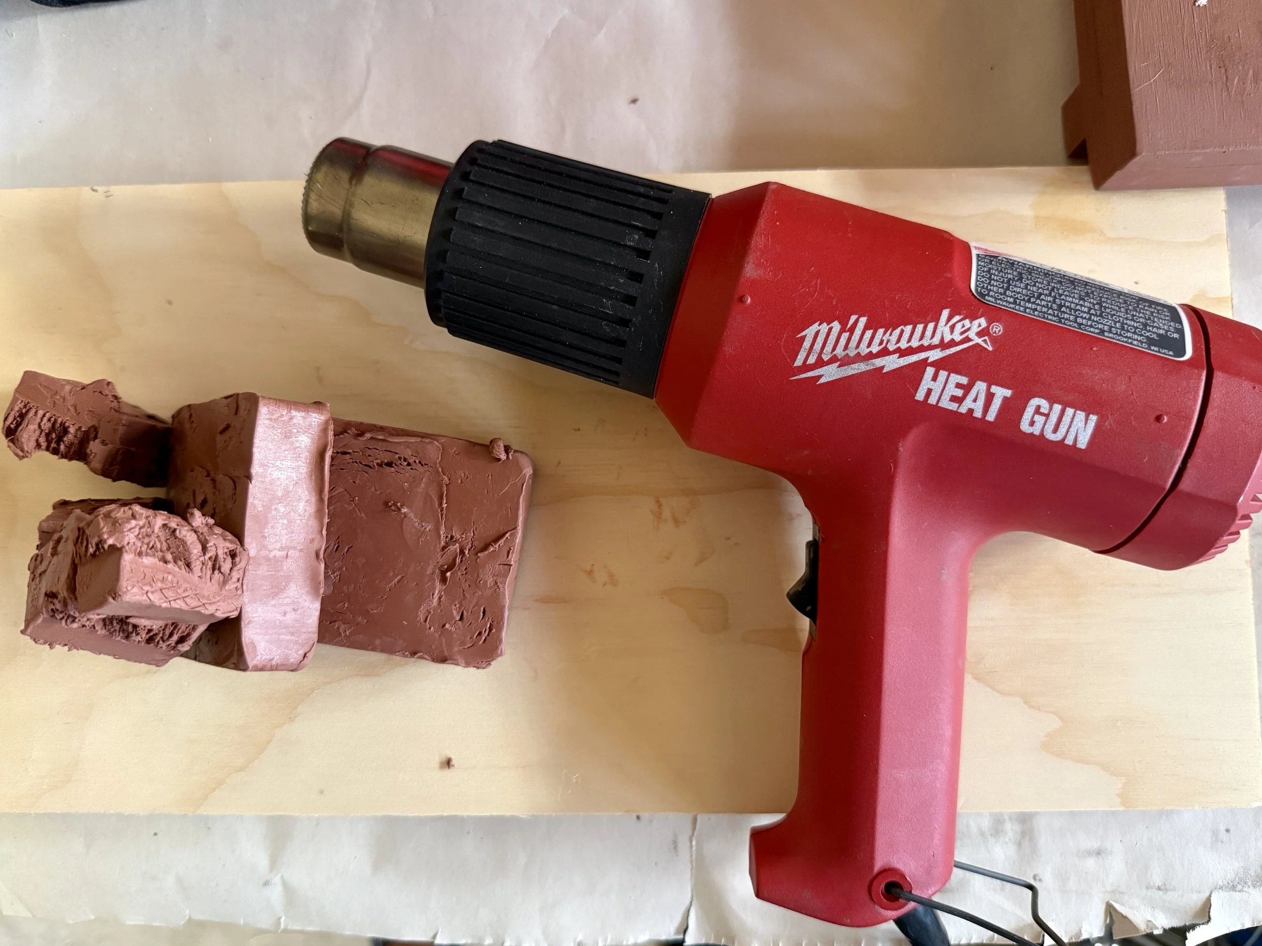 Milwaukee Heat Gun and small pile of oil based clay