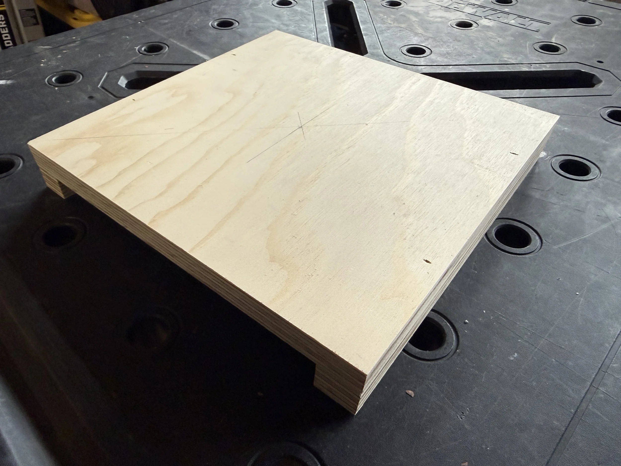 A wooden base used for a portrait sculpture