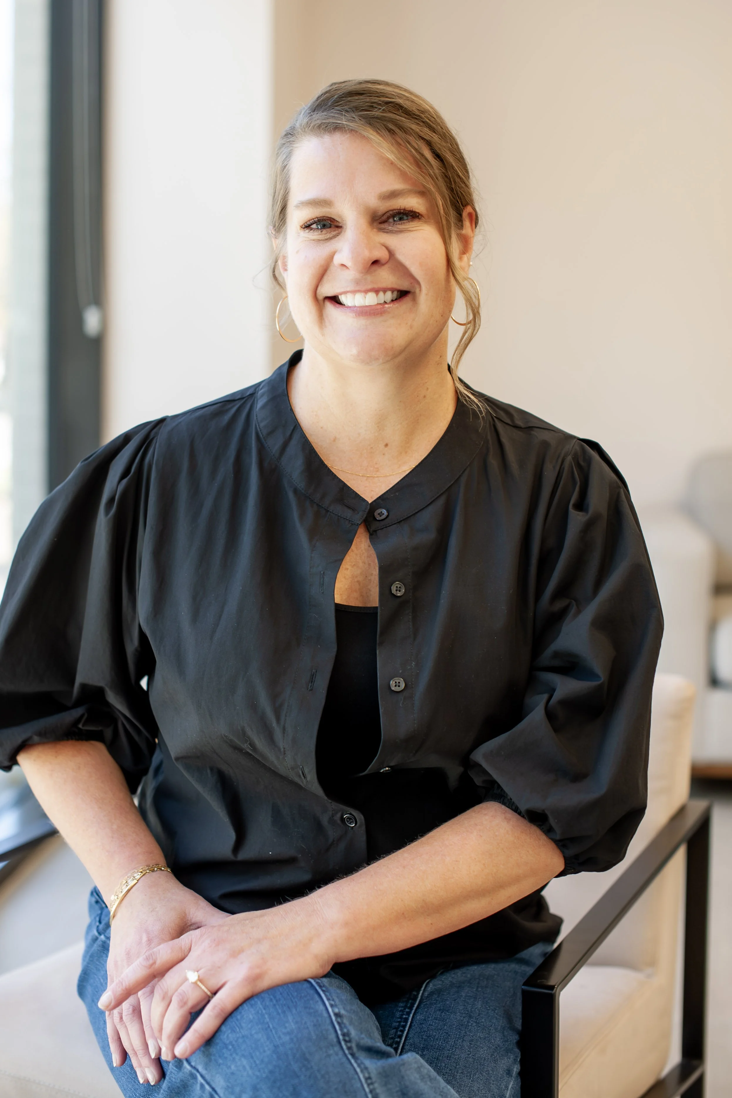 an image of Jill AlJundi smiling at the camera