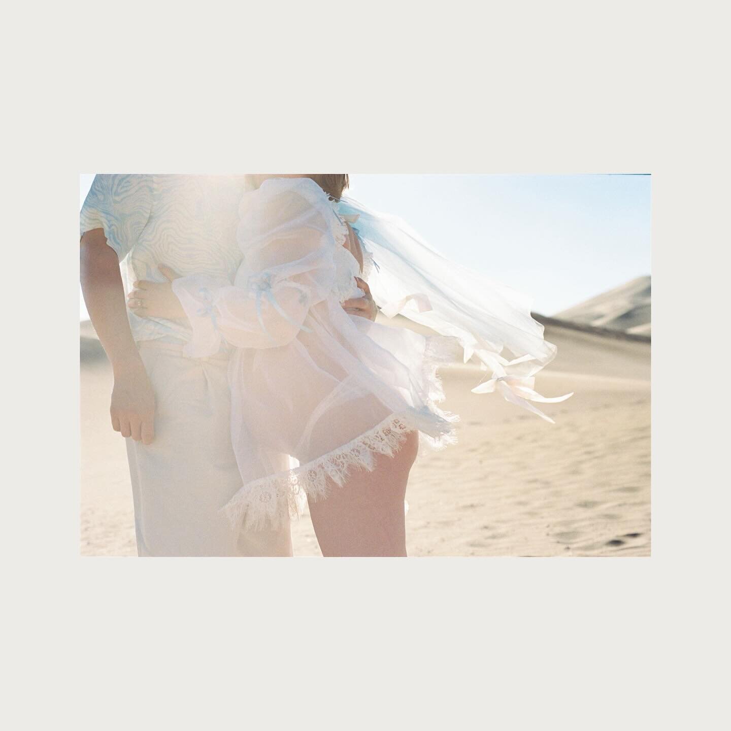 A love letter to Brenna &amp; Noah &amp; the desert sun. Brenna&rsquo;s ethereal dress by @madisonchamberlain_ 

🏷
#Filmweddingphotographer #filmwedding #weddingsonfilm #coloradowedding #coloradoweddingphotographer Colorado desert sand dunes elopeme