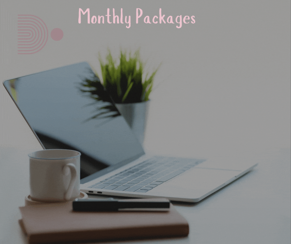 A laptop, a white coffee mug, a closed notebook, and a black pen on a light-colored surface with a potted plant reflected in the laptop screen. The background is light and blurred, with pink text that reads 'Monthly Packages' at the top.