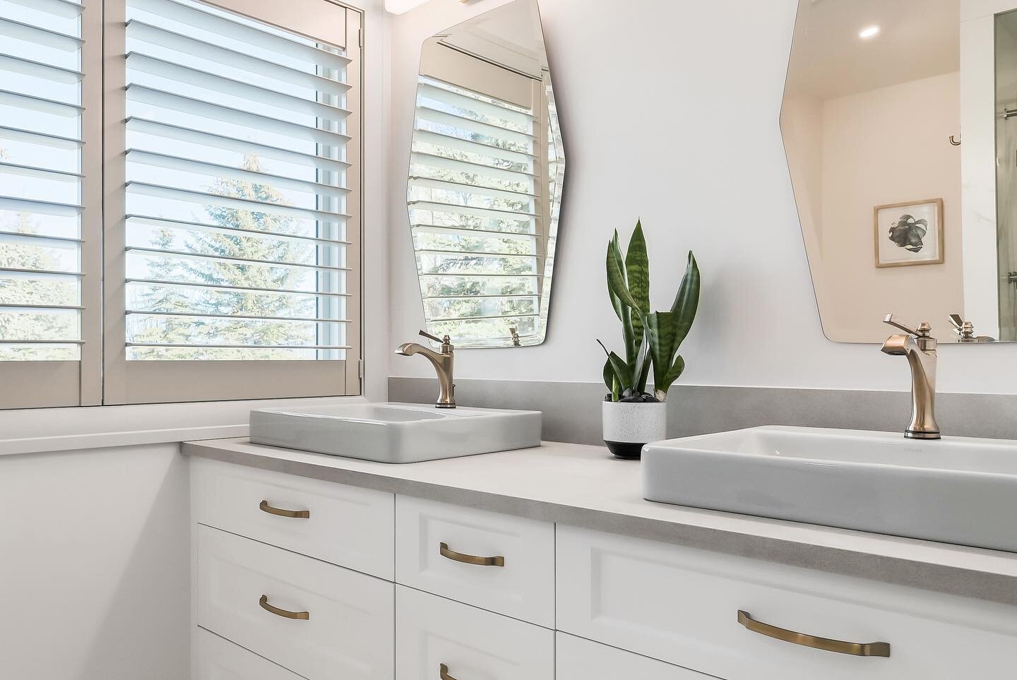 Same bathroom, removed soaker tub and flip flopped vanity to create space for oversized shower. Simple, elegant, and timeless finishings.