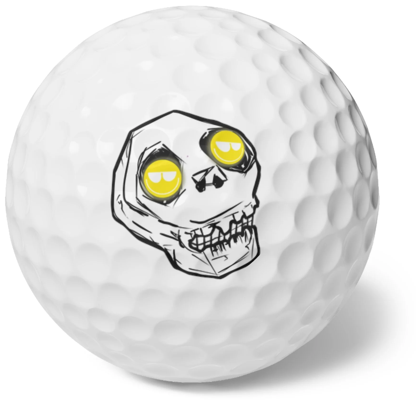 A close-up of a white golf ball with a black and yellow skull logo with yellow eyes and sunglasses painted on it.