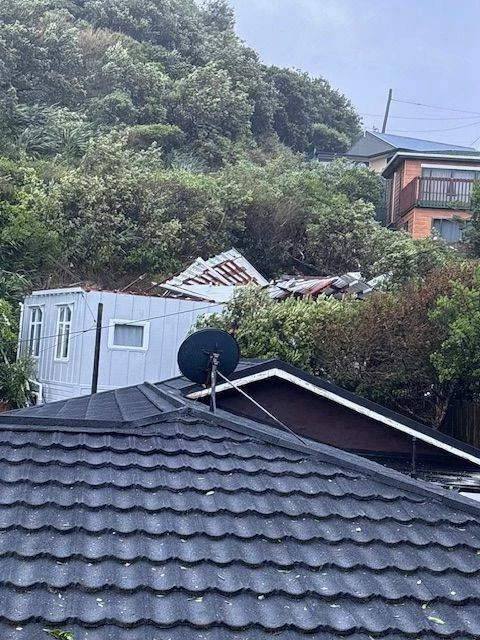 Linwood Way, Island Bay. House has lost its roof during the night. Photo by Margaret