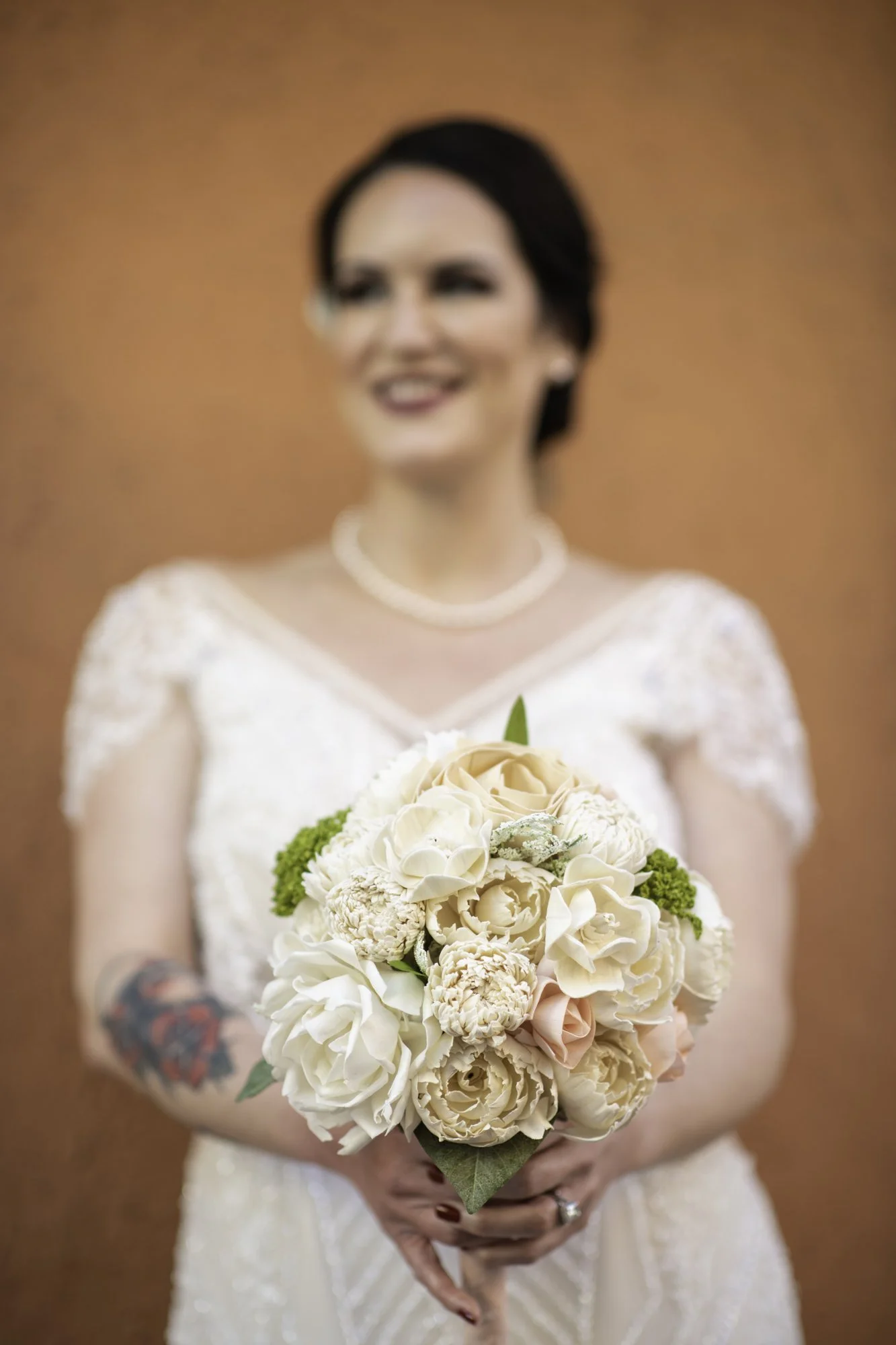 bride_smiling-holding-flowers.jpg