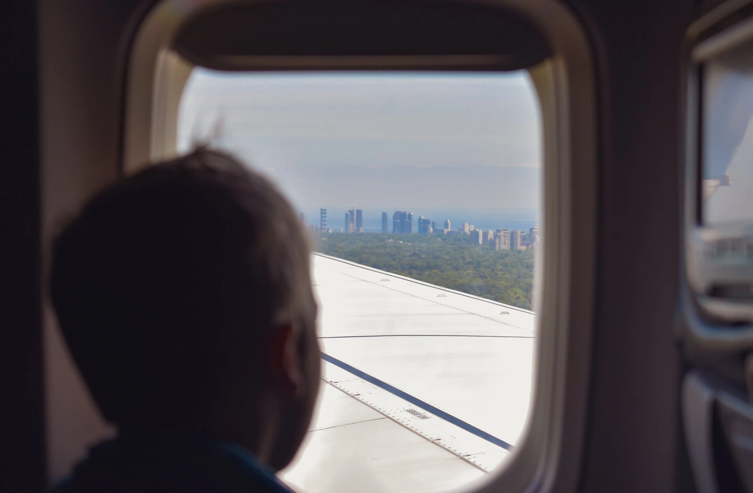 WebPhoto_Child_Windowseat_Watermarked.jpg