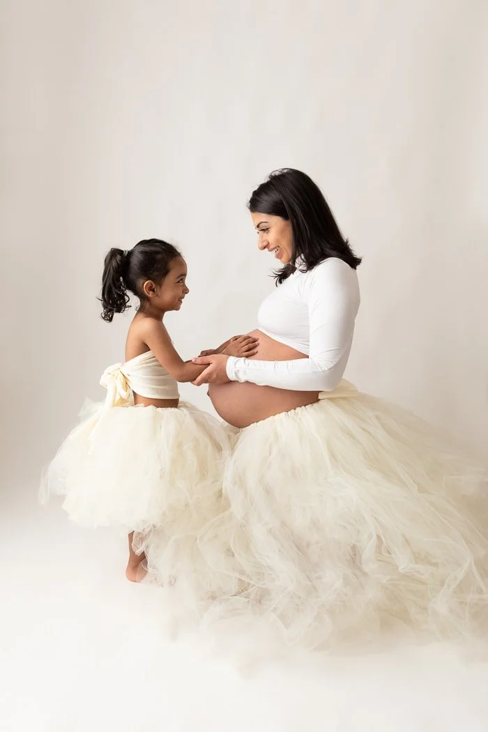 Maternity in studio with eldest