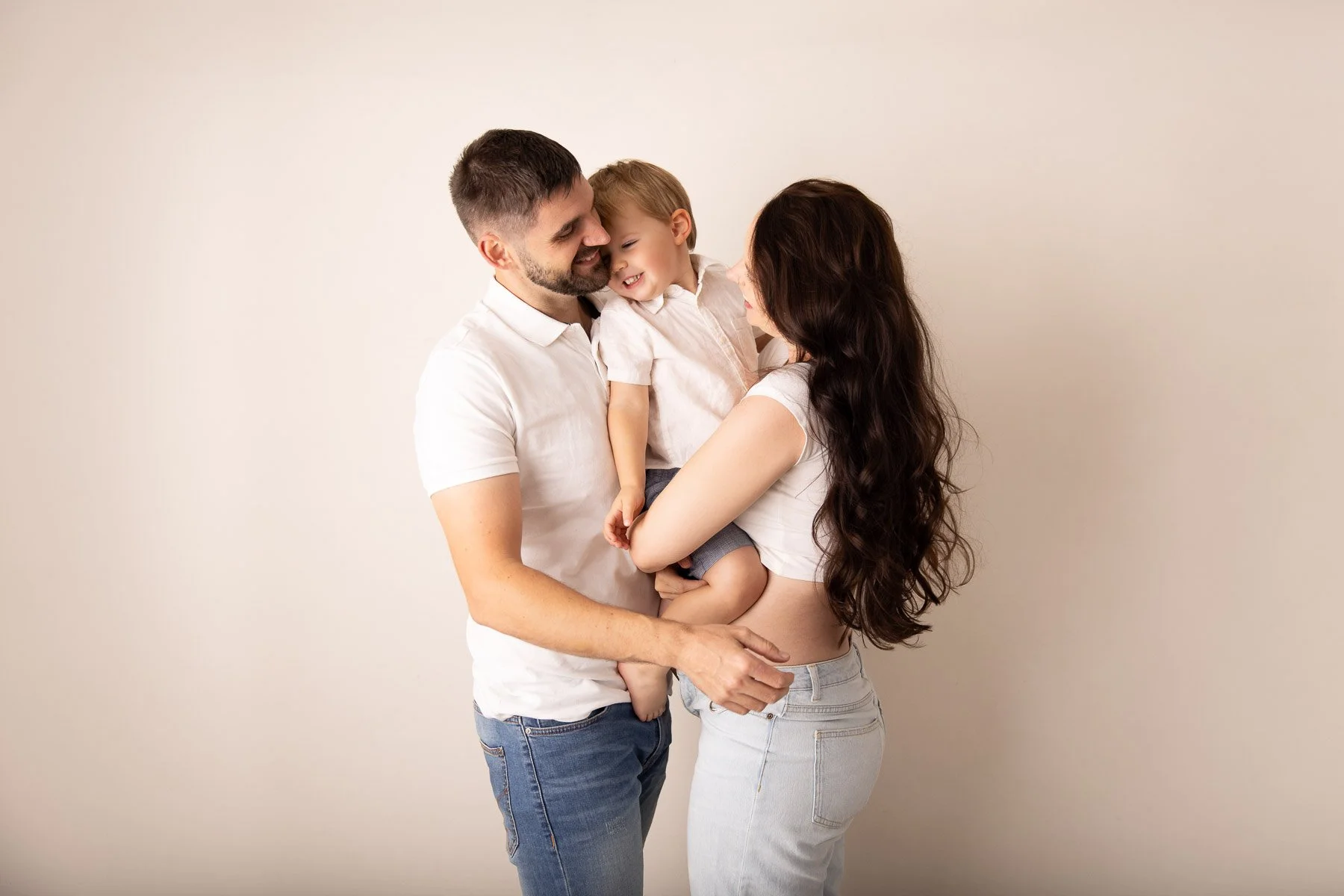 casual family maternity photography including toddlers in studio