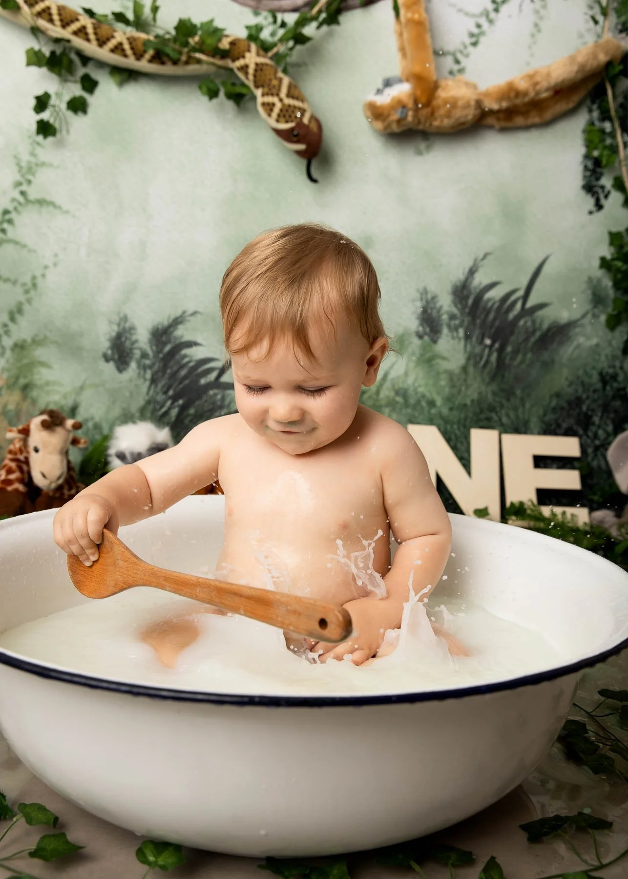 Cake smash photographer Sydney North Shore
Jungle theme baby smiling in a bath