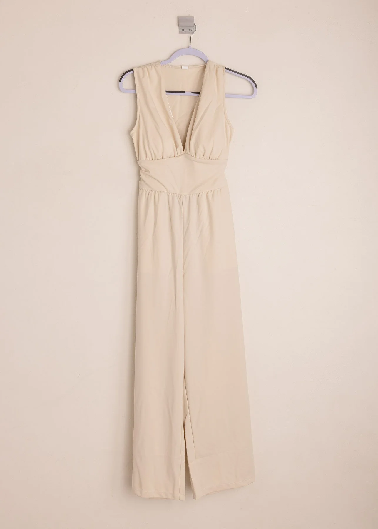Cream jumpsuit, size 8-10