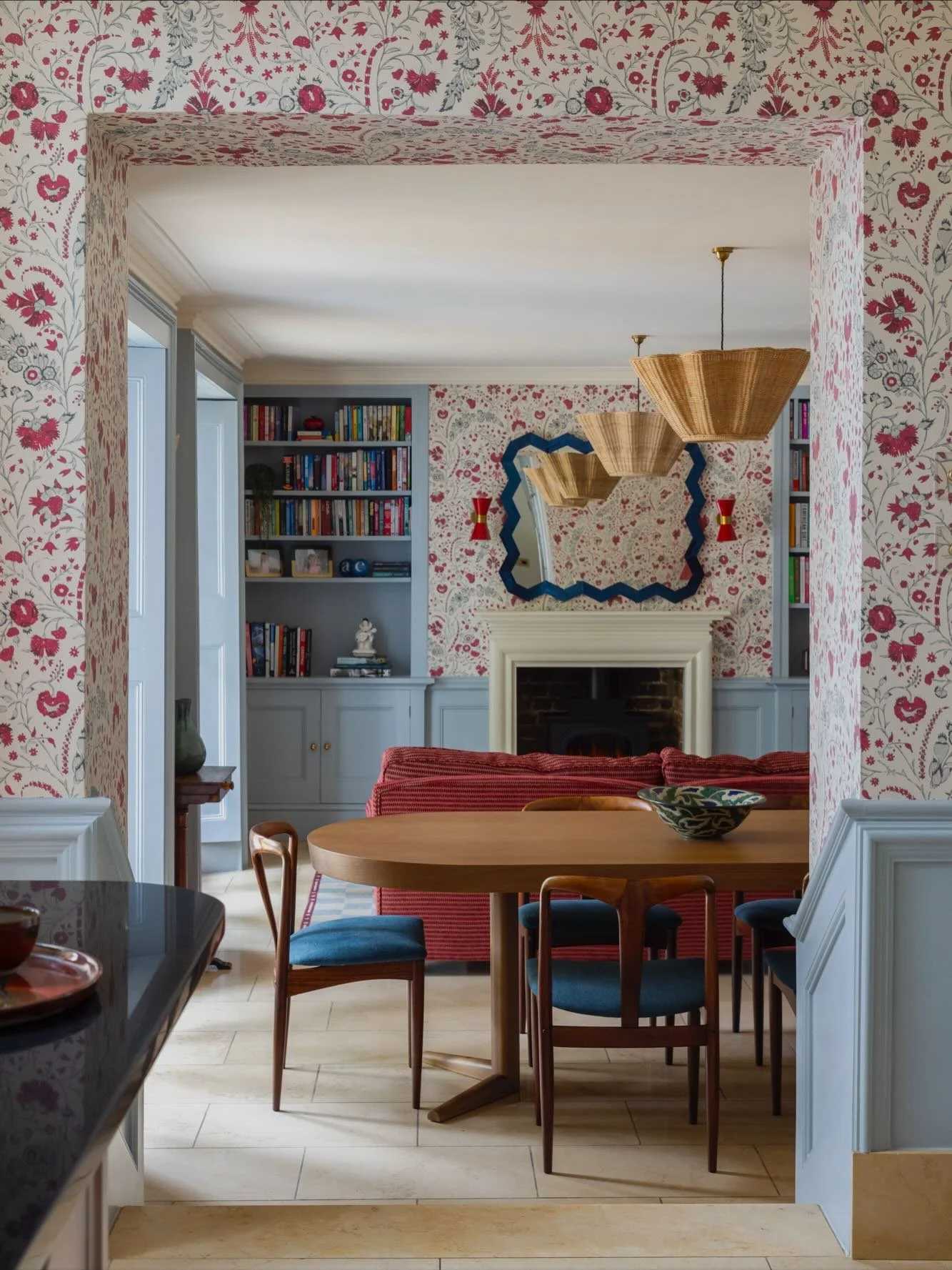 A view into the garden room from the kitchen in our Barnes project &mdash; where we wanted a clear focal point to anchor the space.

We reopened the blocked fireplace, brought in a wood-burning stove and introduced a touch of drama with a statement z