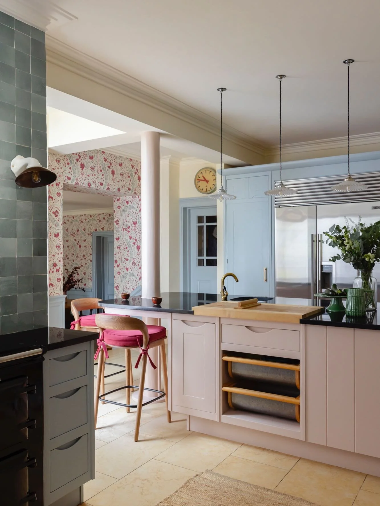 A closer look at the kitchen in our Barnes project &mdash; where small, thoughtful updates help the room feel warmer and more characterful.

Our client wanted to keep existing units, countertop and flooring, so we drew colour from the garden room sch