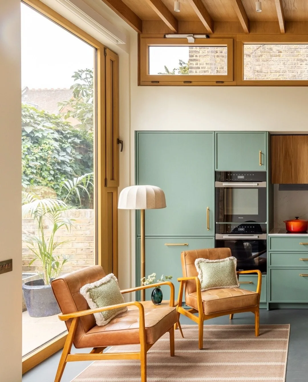 A closer look at the kitchen in our Chiswick project &hearts;️

We wanted this contemporary extension to feel warm and characterful, so chose soft green cabinetry, reeded oak, aged brass and plenty of natural timber, with warm terracotta running thro