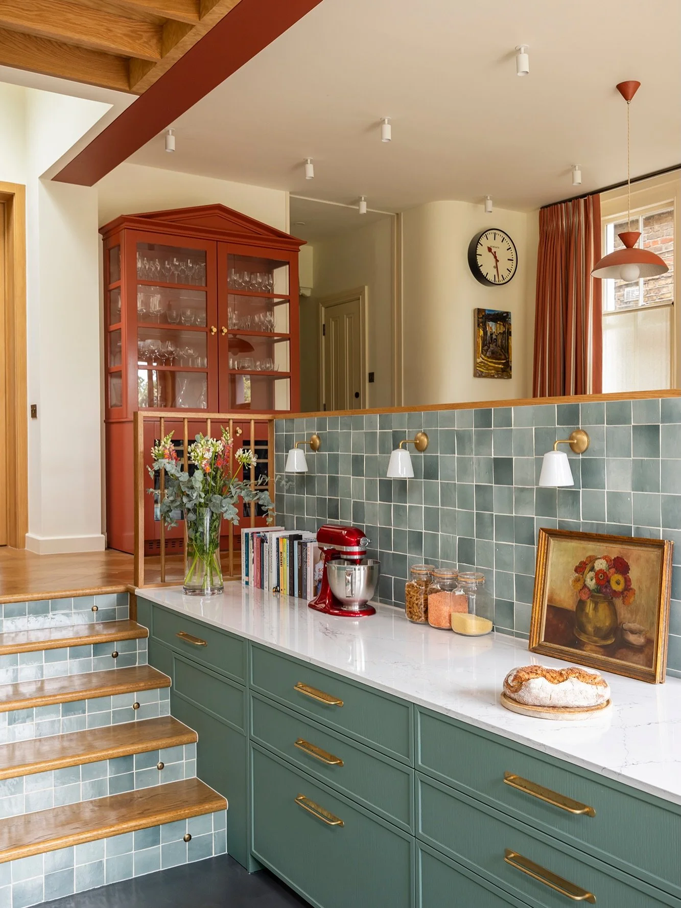 A little Picture Gallery Red goes a long way in our Chiswick Project. 

The wine cooler and glass cabinet were designed to feel more like a freestanding piece of furniture than kitchen joinery - sitting comfortably in the raised dining area rather th