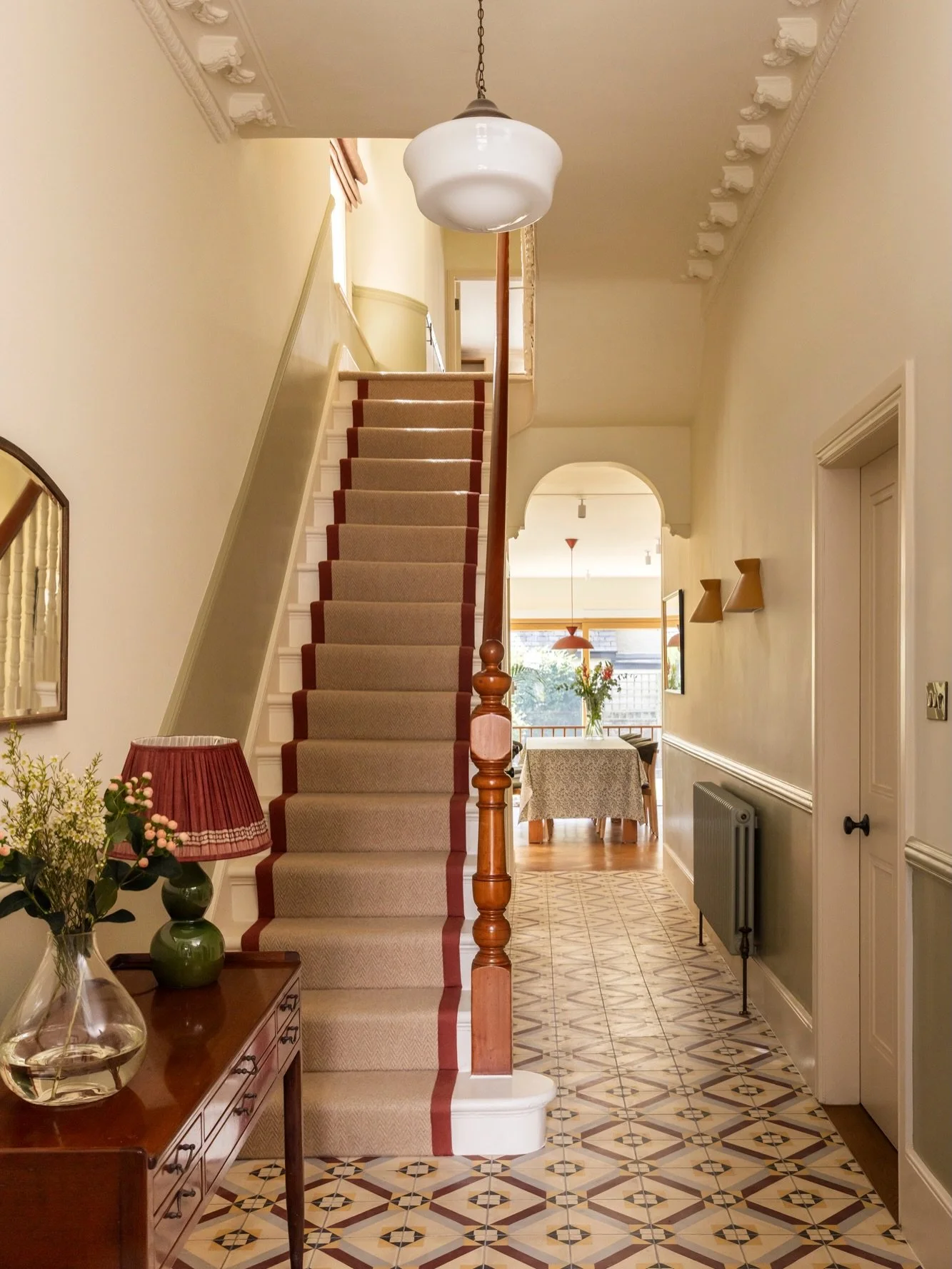 A nod to the past in our Chiswick project. 

We chose these encaustic floor tiles for the hallway as a contemporary nod to the home&rsquo;s Edwardian roots - picking up on the colours and details in the original terracotta porch tiles and carrying th