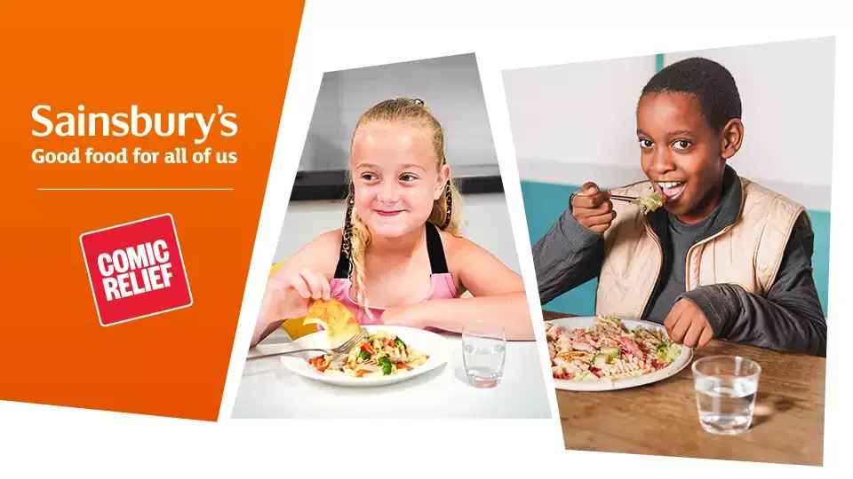 A young, white girl in a school setting, smiling off camera and eating with her hands from a plate in front of her. A second image shows a young, black boy eating pasta salad with a fork and smiling to camera.