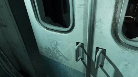 Sliding doors of a subway train with interior view.