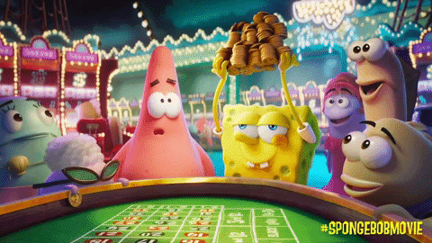 Animated characters celebrating at a roulette table with winnings in a casino setting from The SpongeBob Movie.