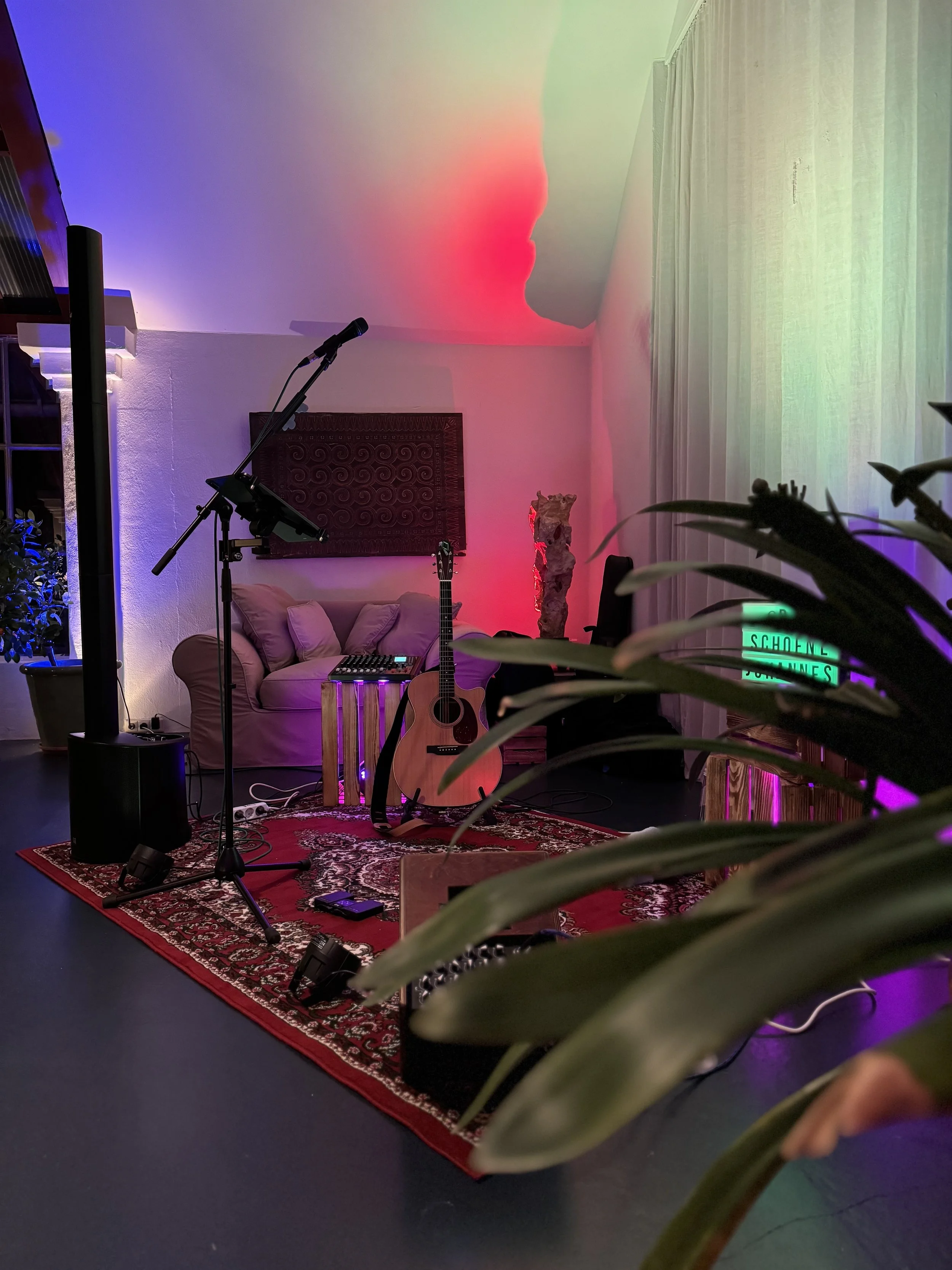 A cozy room filled with music stuff 